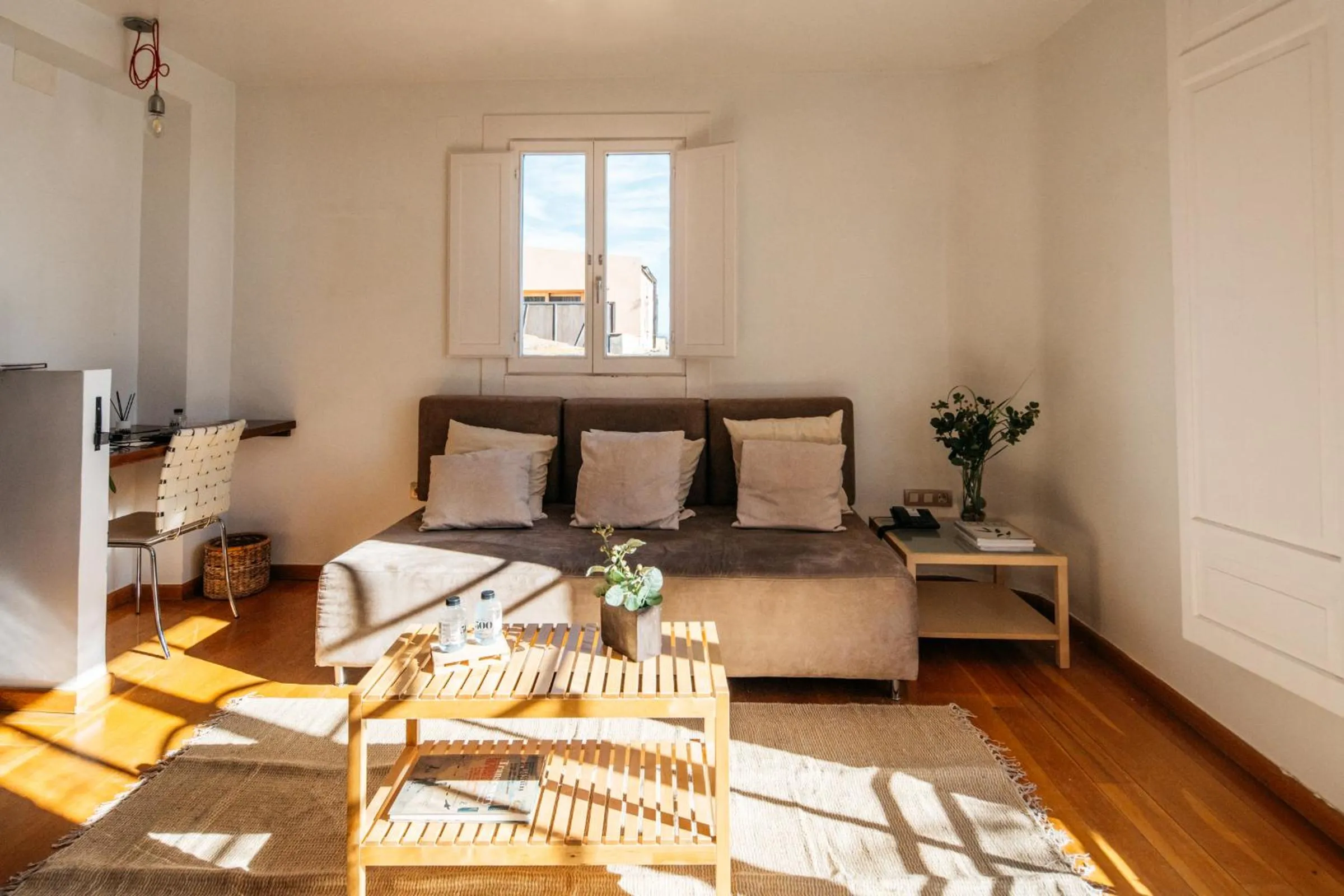 Seating area, Bed in Hotel Boutique Mas Passamaner
