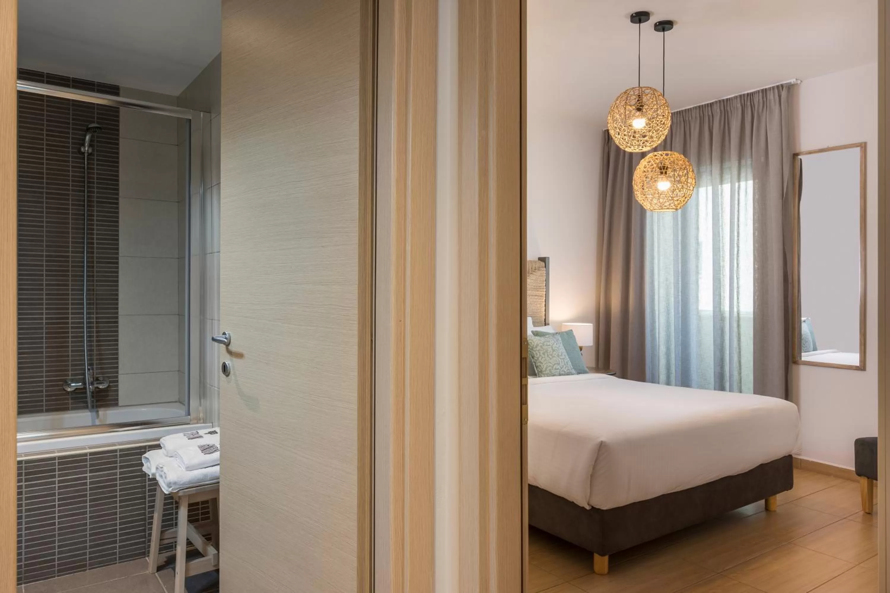 Bedroom, Bed in Trianon Luxury Apartments & Suites