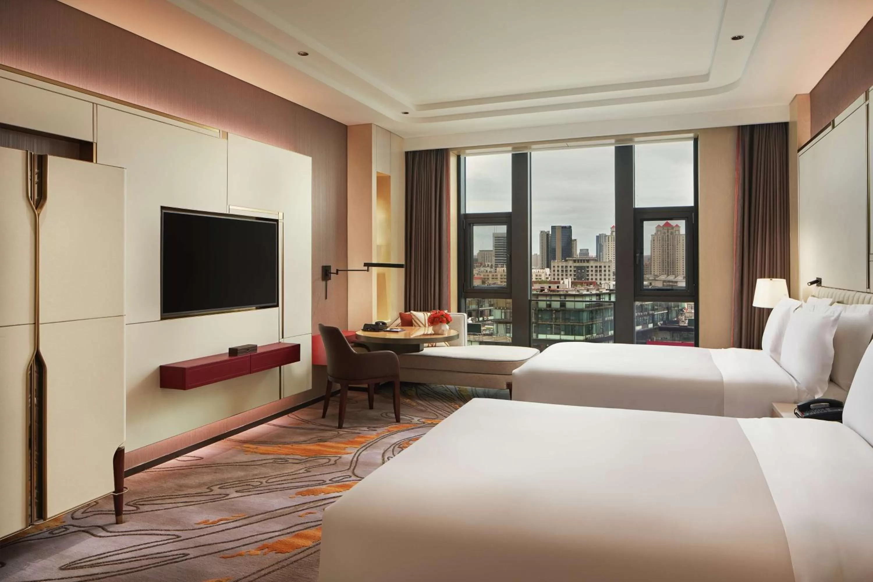 Living room, Bed in Conrad Tianjin