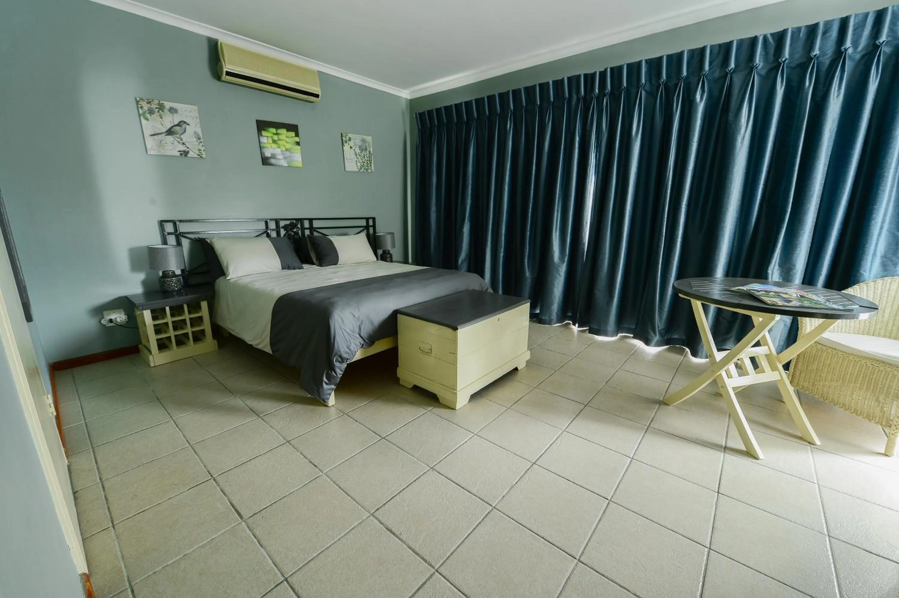 Bed in De Wingerd Wijnland Lodge