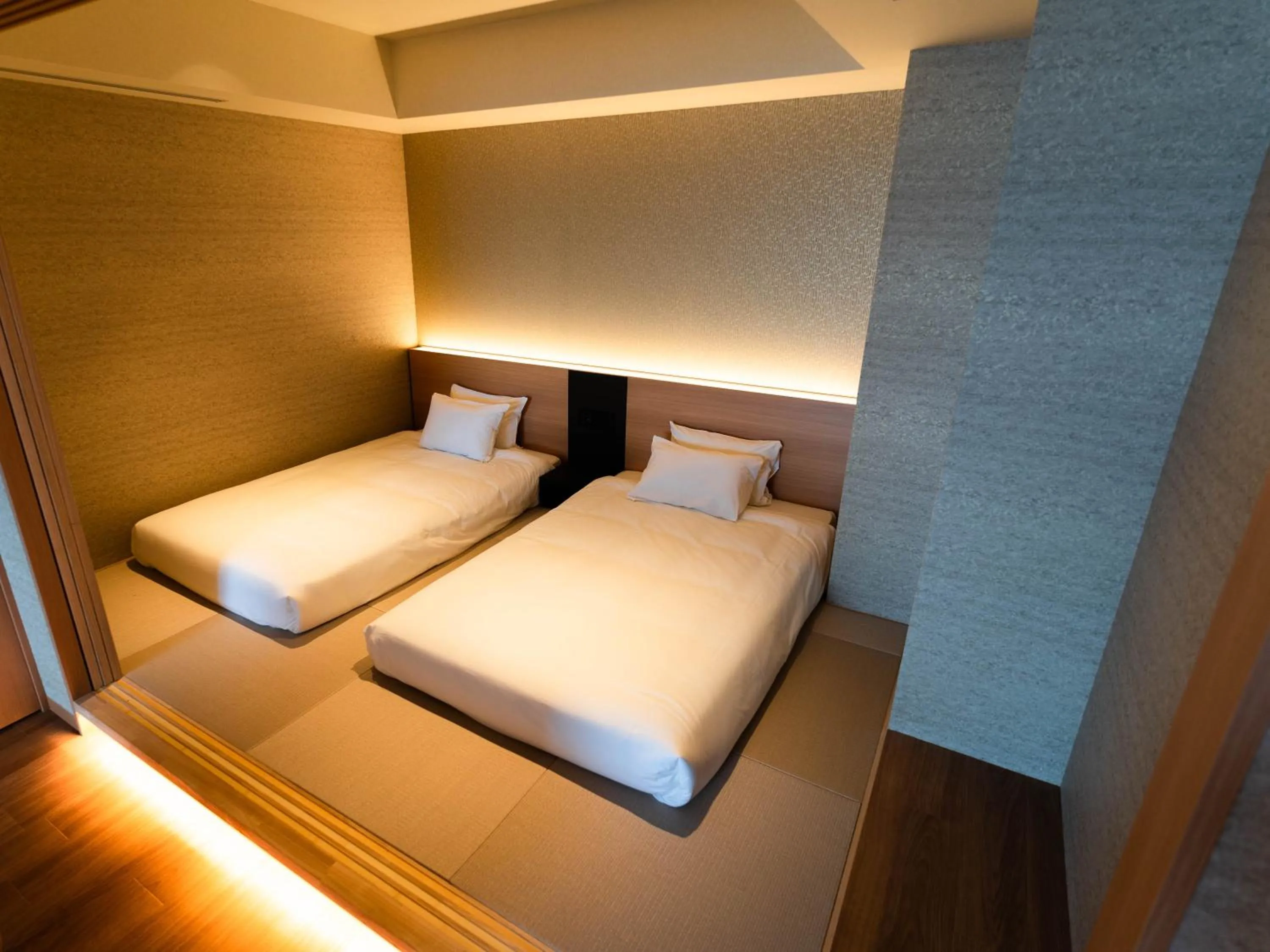 Bed in Hakodate Yunokawa Onsen Umi to Akari Hewitt Resort