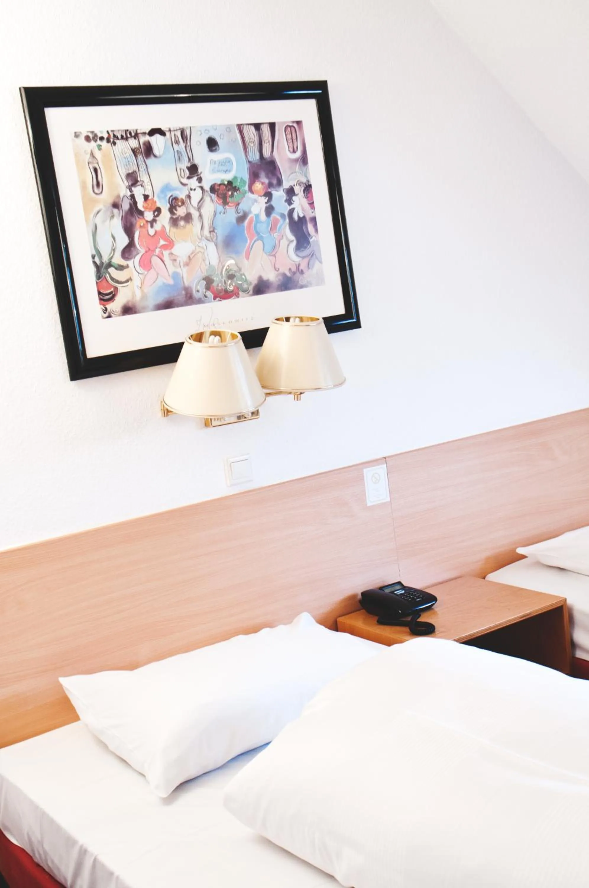 Bed in Hotel Batavia