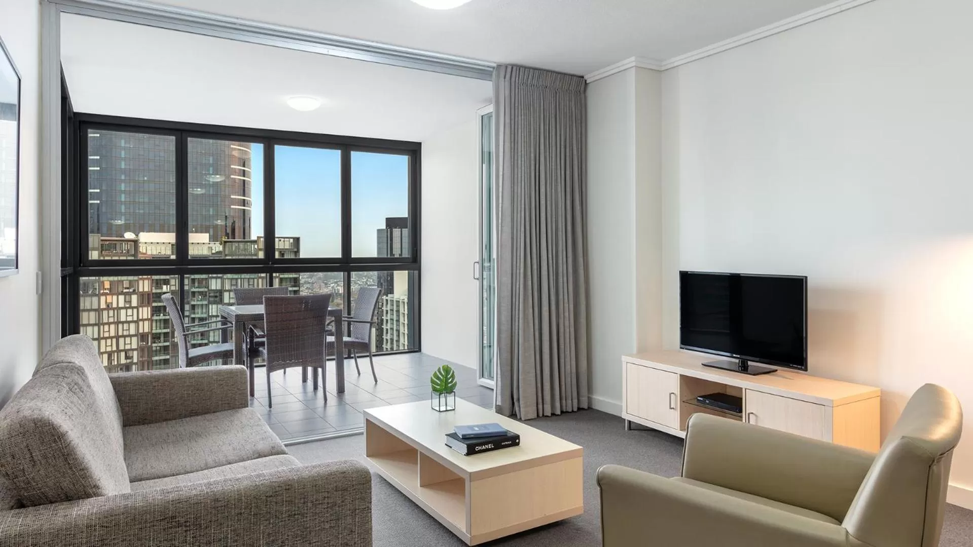 Communal lounge/ TV room in Oaks Brisbane on Charlotte Suites