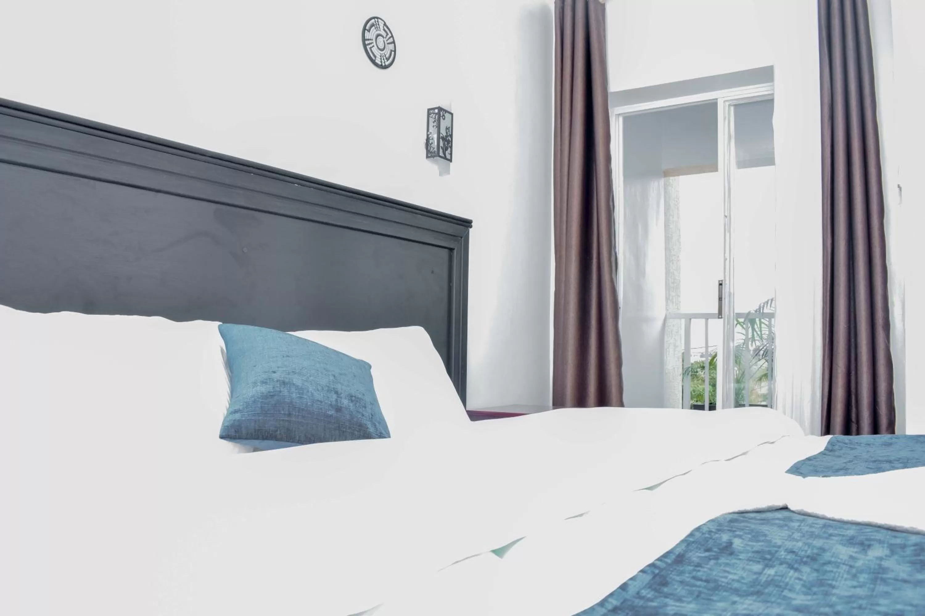 Bed in INZOZI AFRICA HOUSE B&B-Gishushu