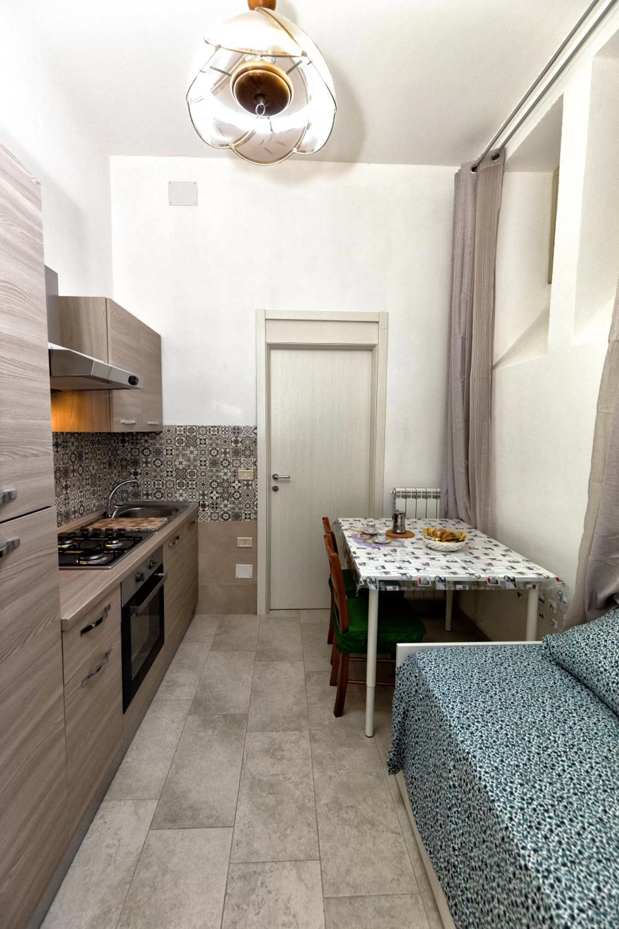 Kitchen/Kitchenette in GARDEN HOUSE: APARTMENTS AND ROOMS FOR HOLIDAYS