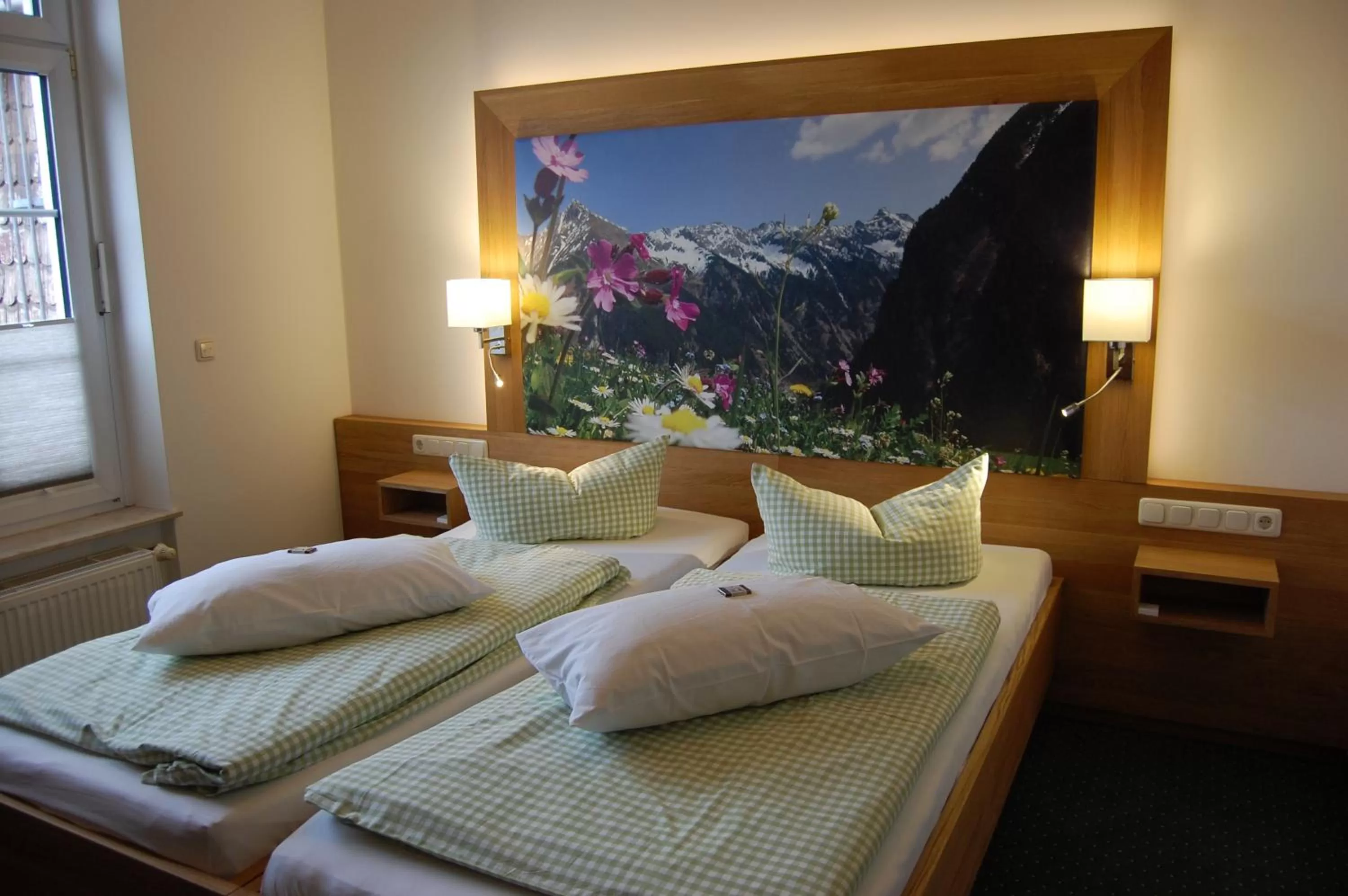 Bed in Biohotel Amadeus