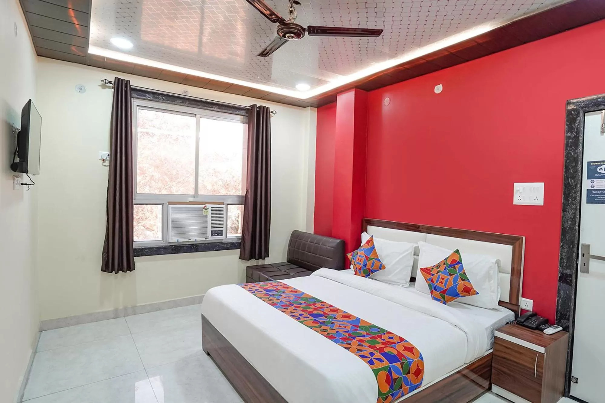Bed in FabHotel Rajdhani