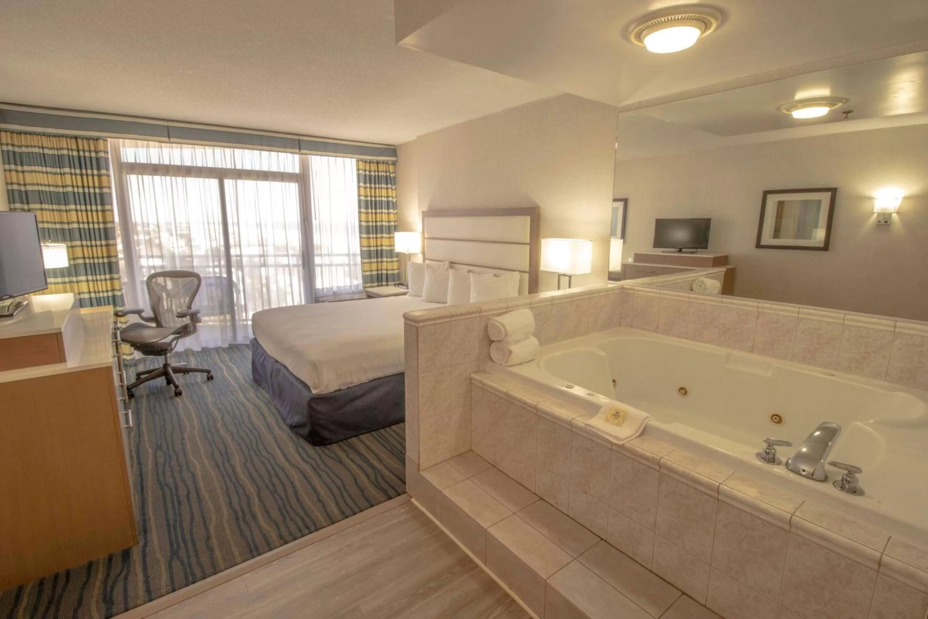 Photo of the whole room, Bed in Wyndham Virginia Beach Oceanfront