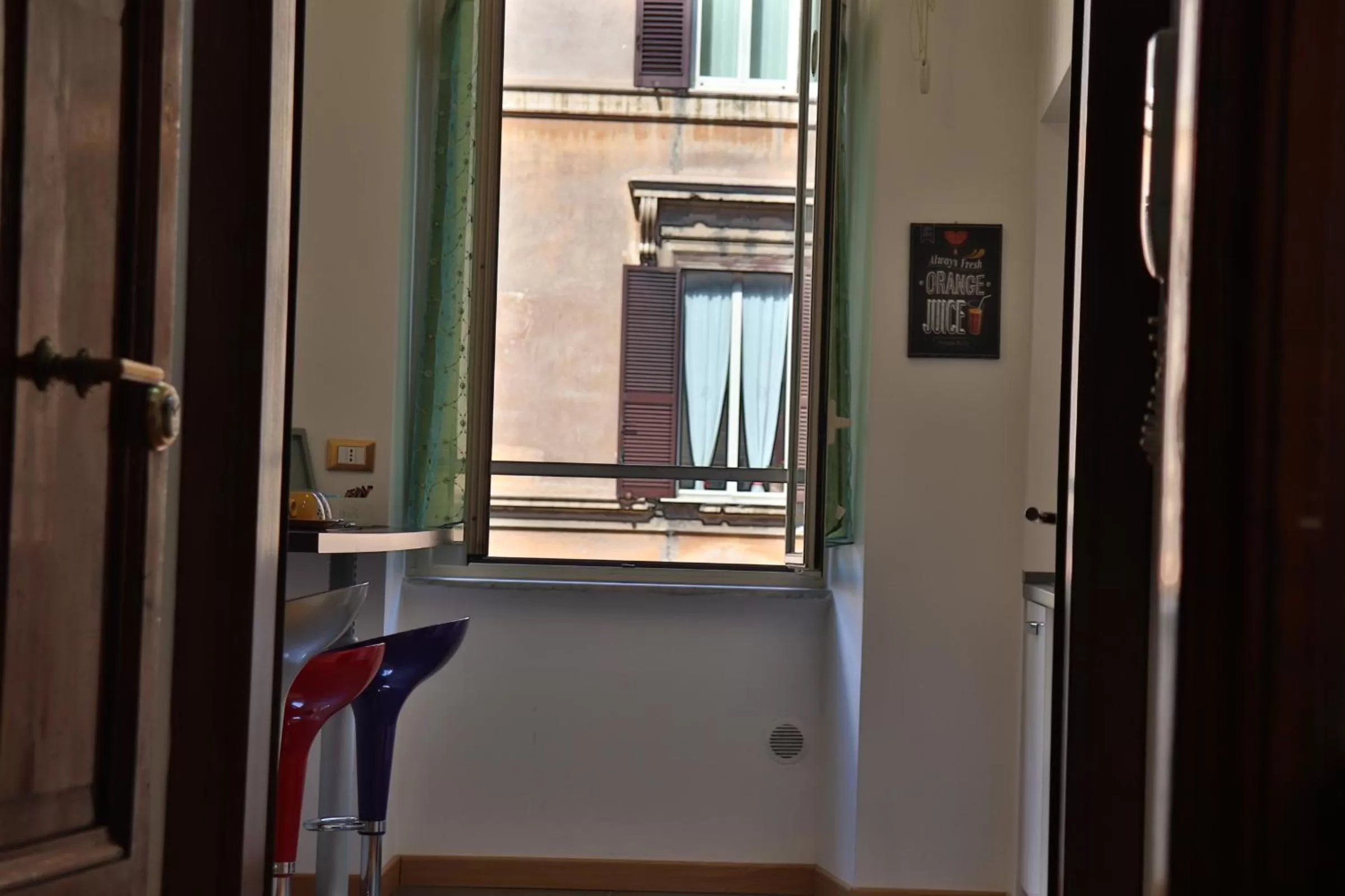 Communal lounge/ TV room in B&B Gaudium Colosseo