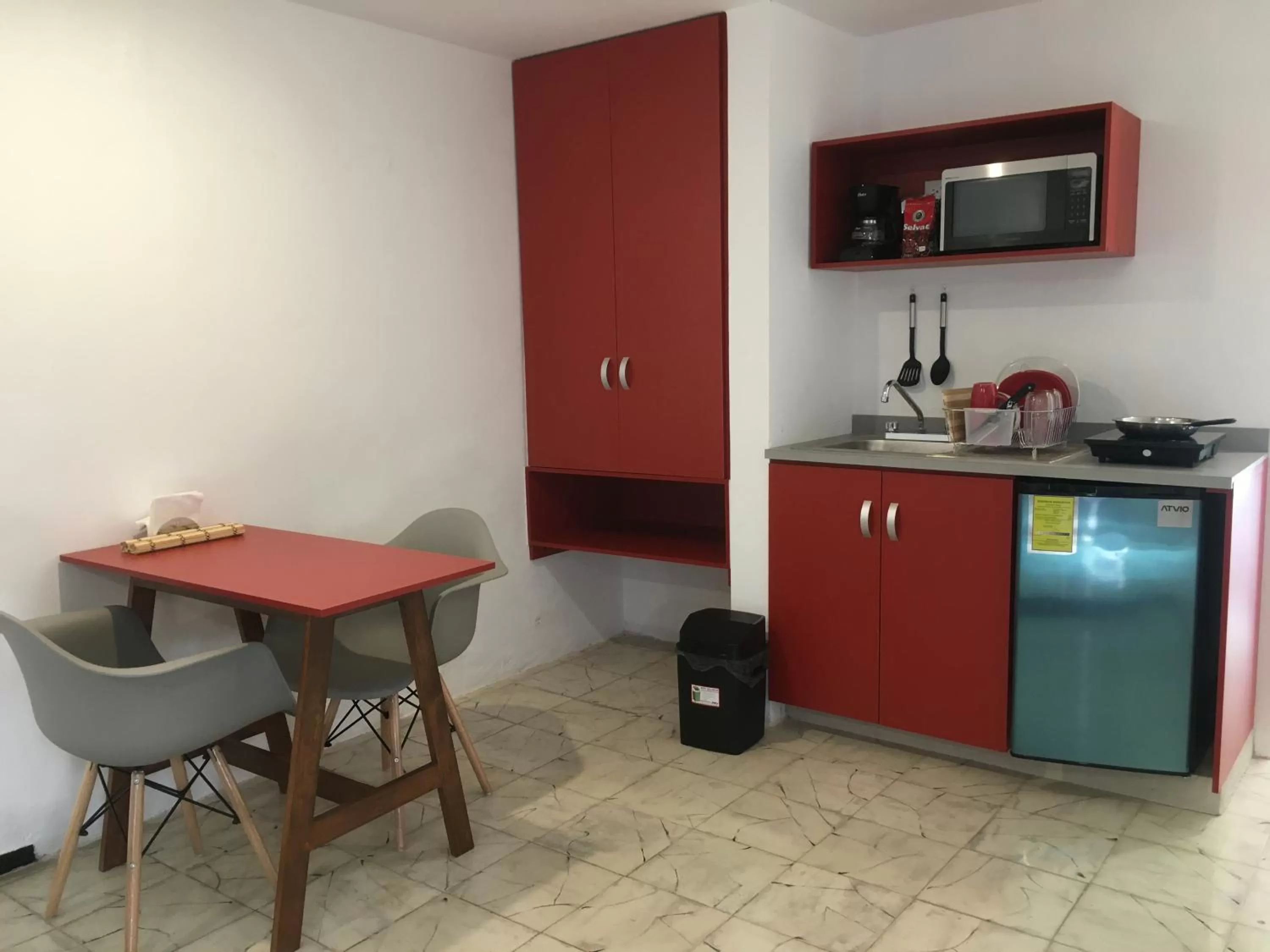Kitchen or kitchenette in Suites del Sureste - Mérida