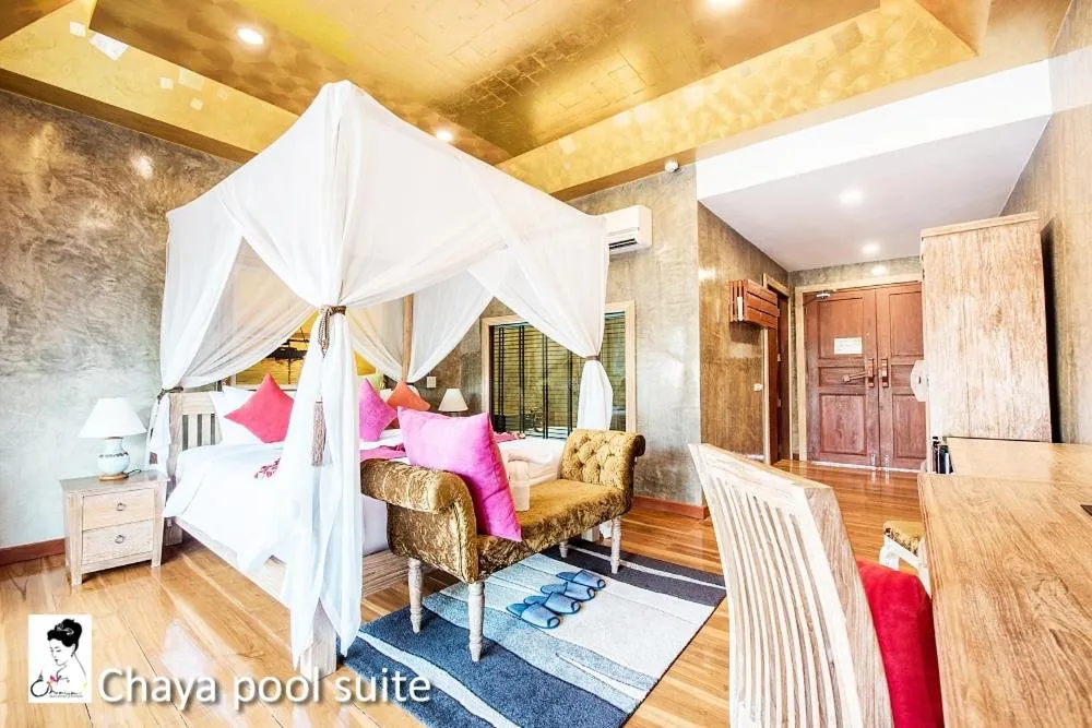 Bed in The Chaya Resort and Spa