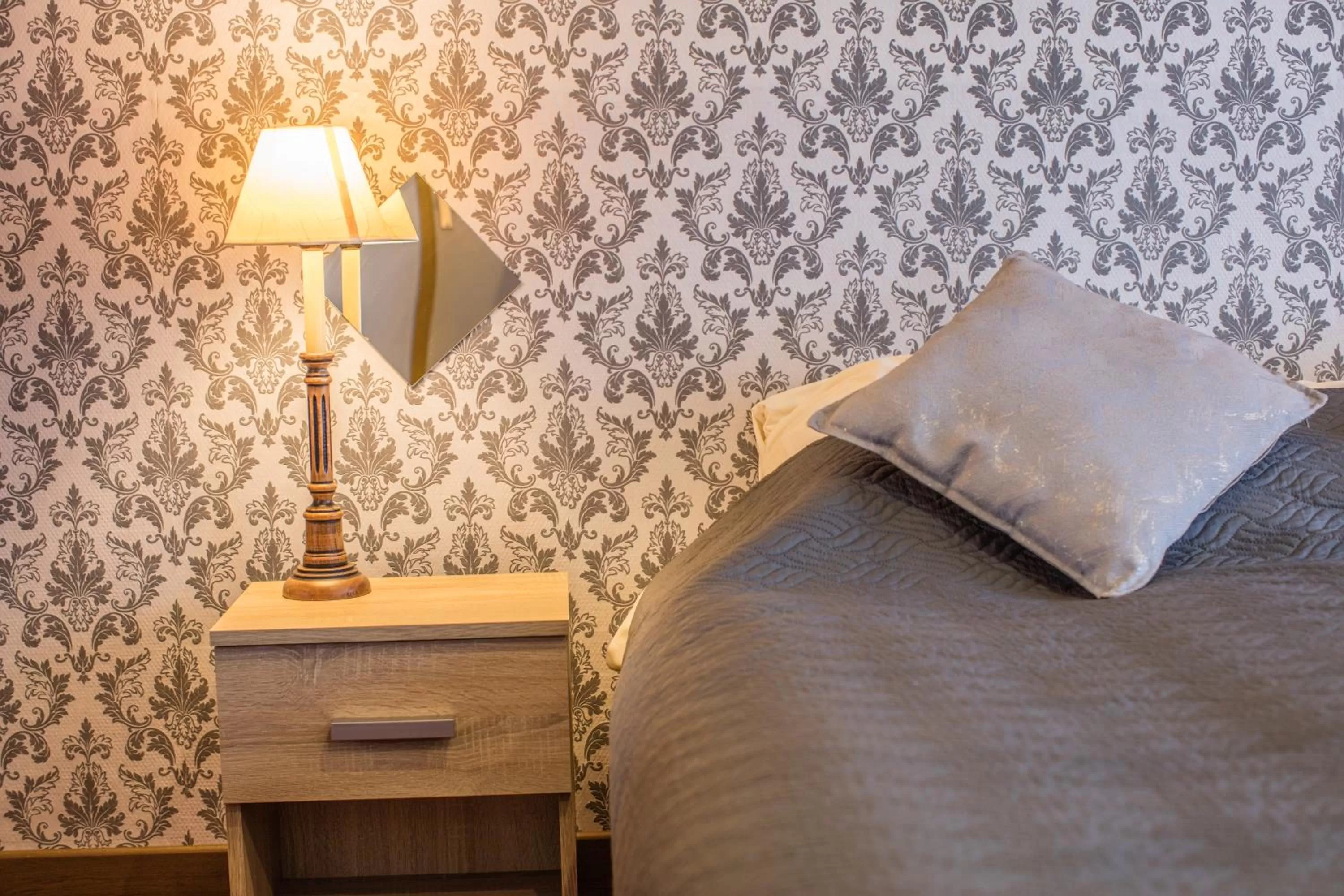 Bed in Hotel Le Provencal