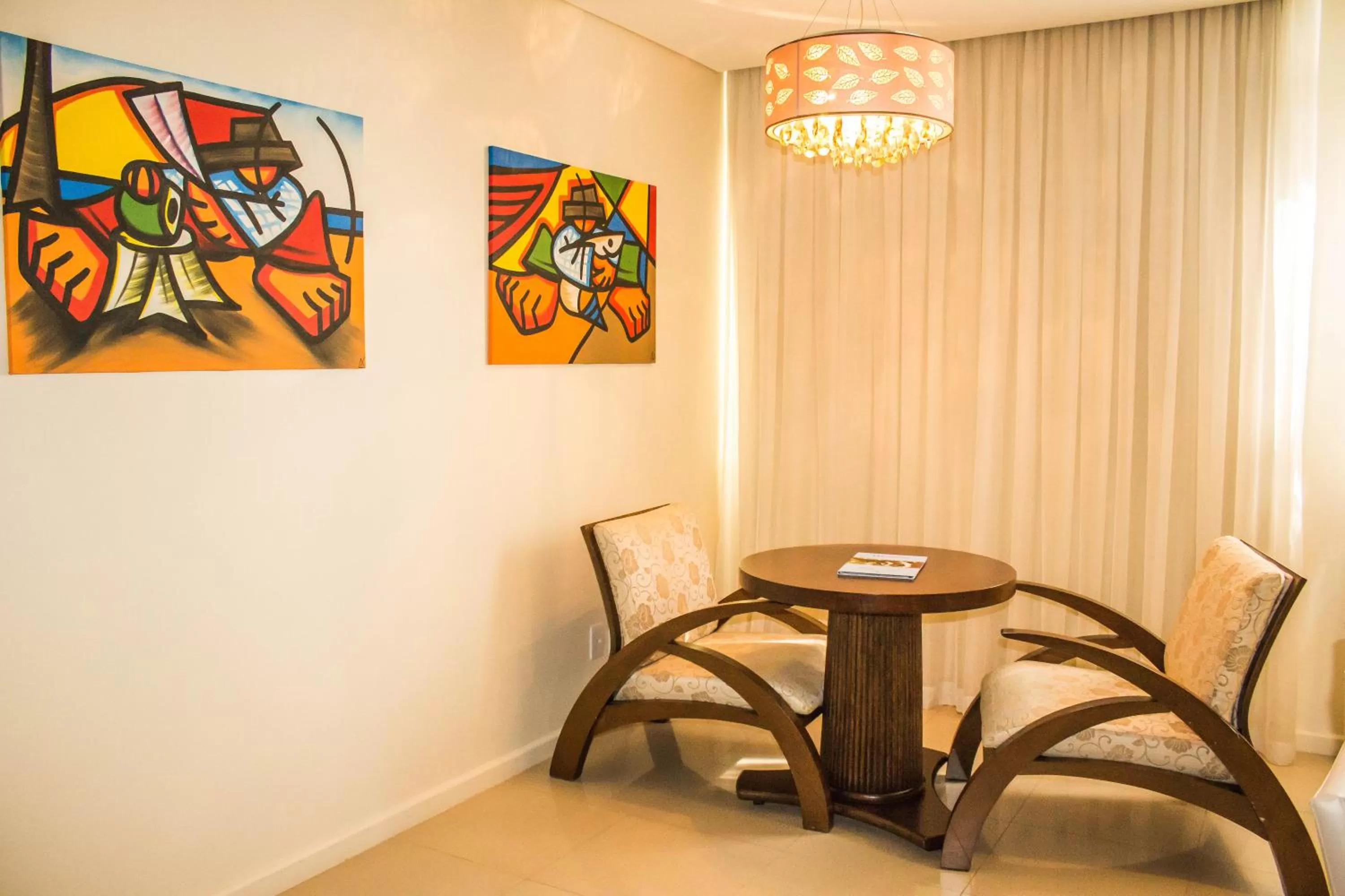 Living room in Wyndham Golden Foz Suítes