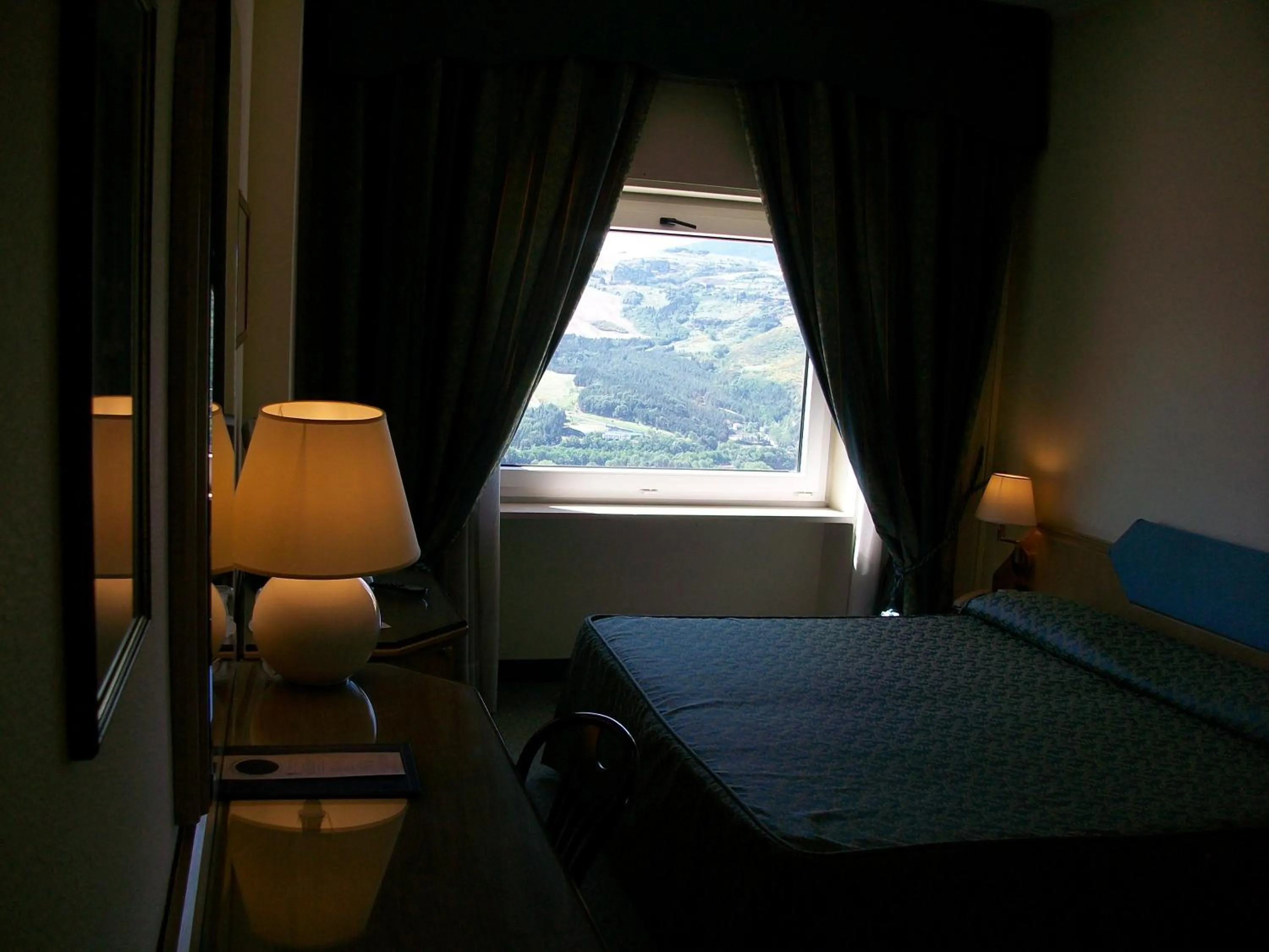 View (from property/room), Bed in Grande Albergo Potenza