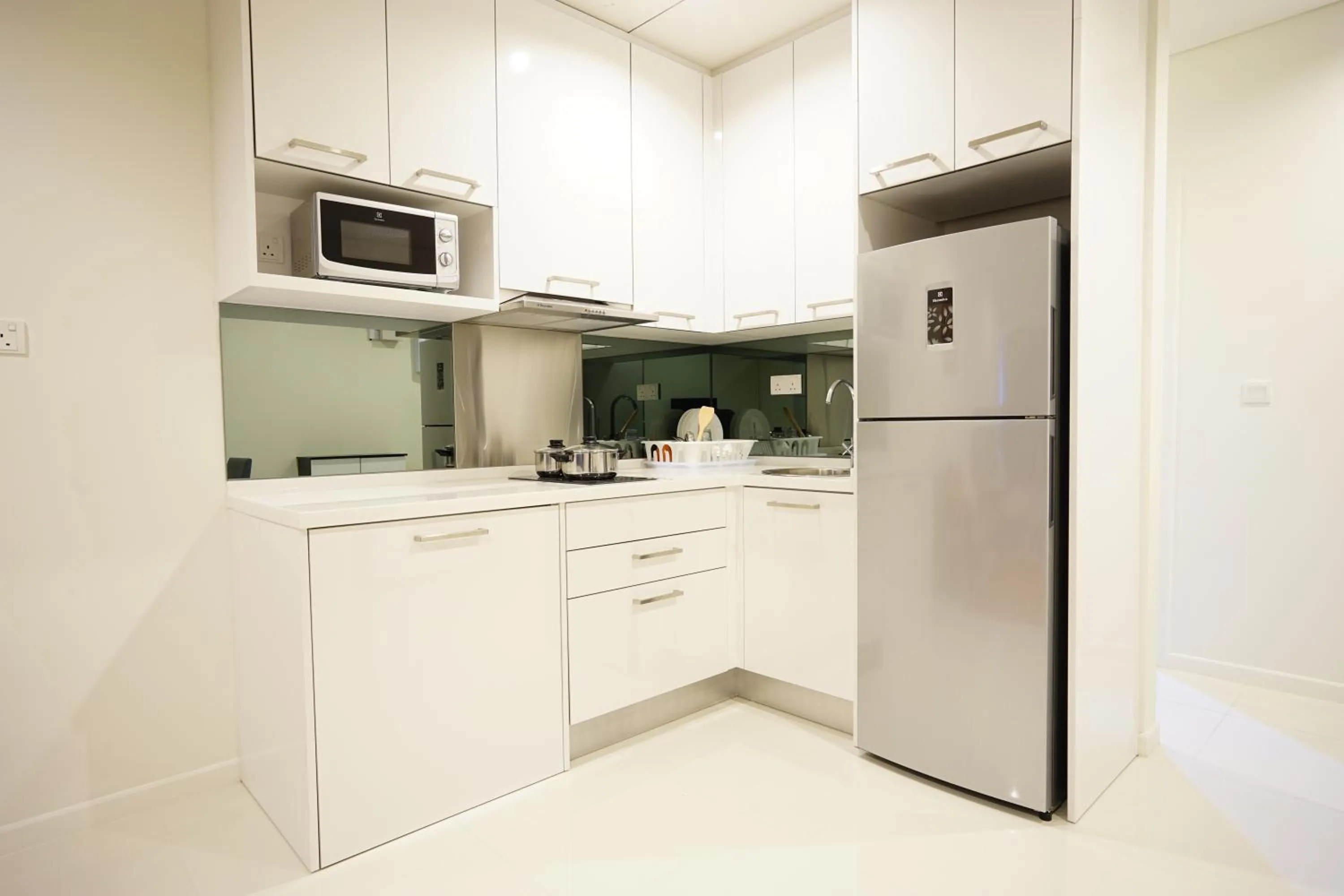 Kitchen or kitchenette in Summer Suites Residences by Subhome