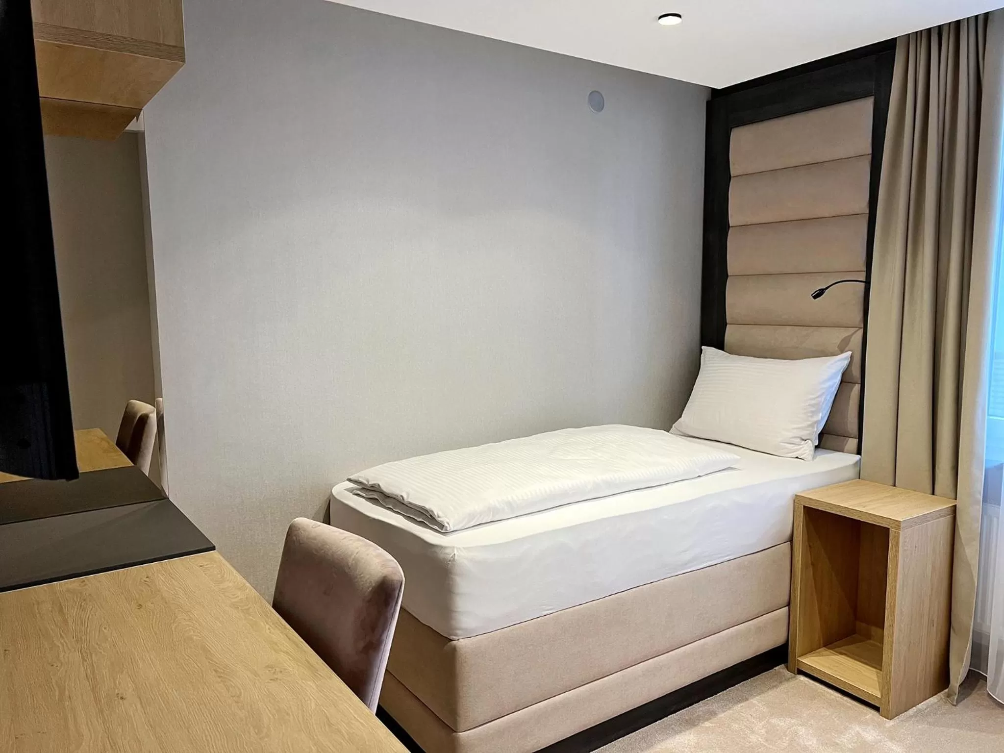 Photo of the whole room, Bed in DORMERO Hotel Reutlingen