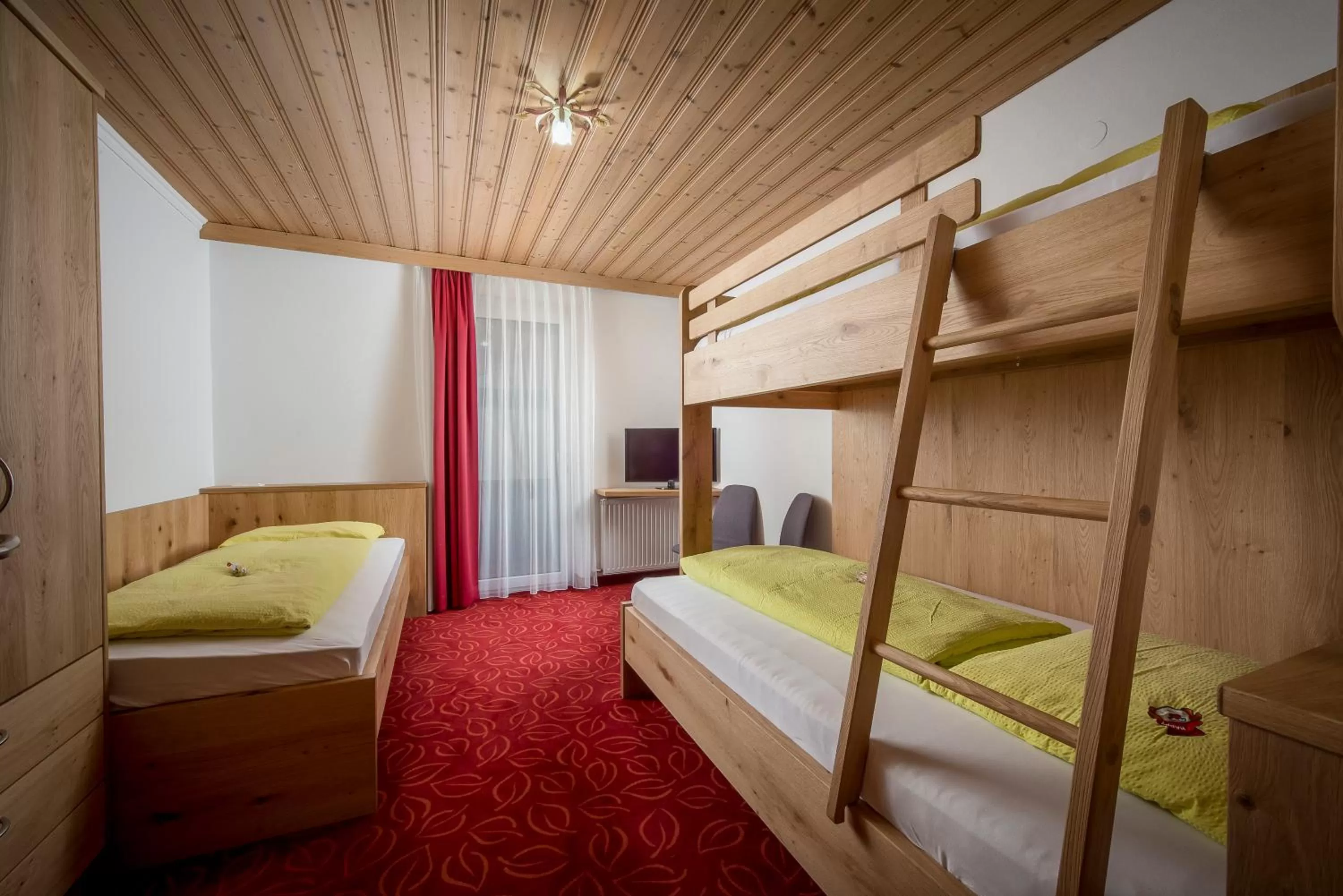 Photo of the whole room, Bed in Familienhotel Central