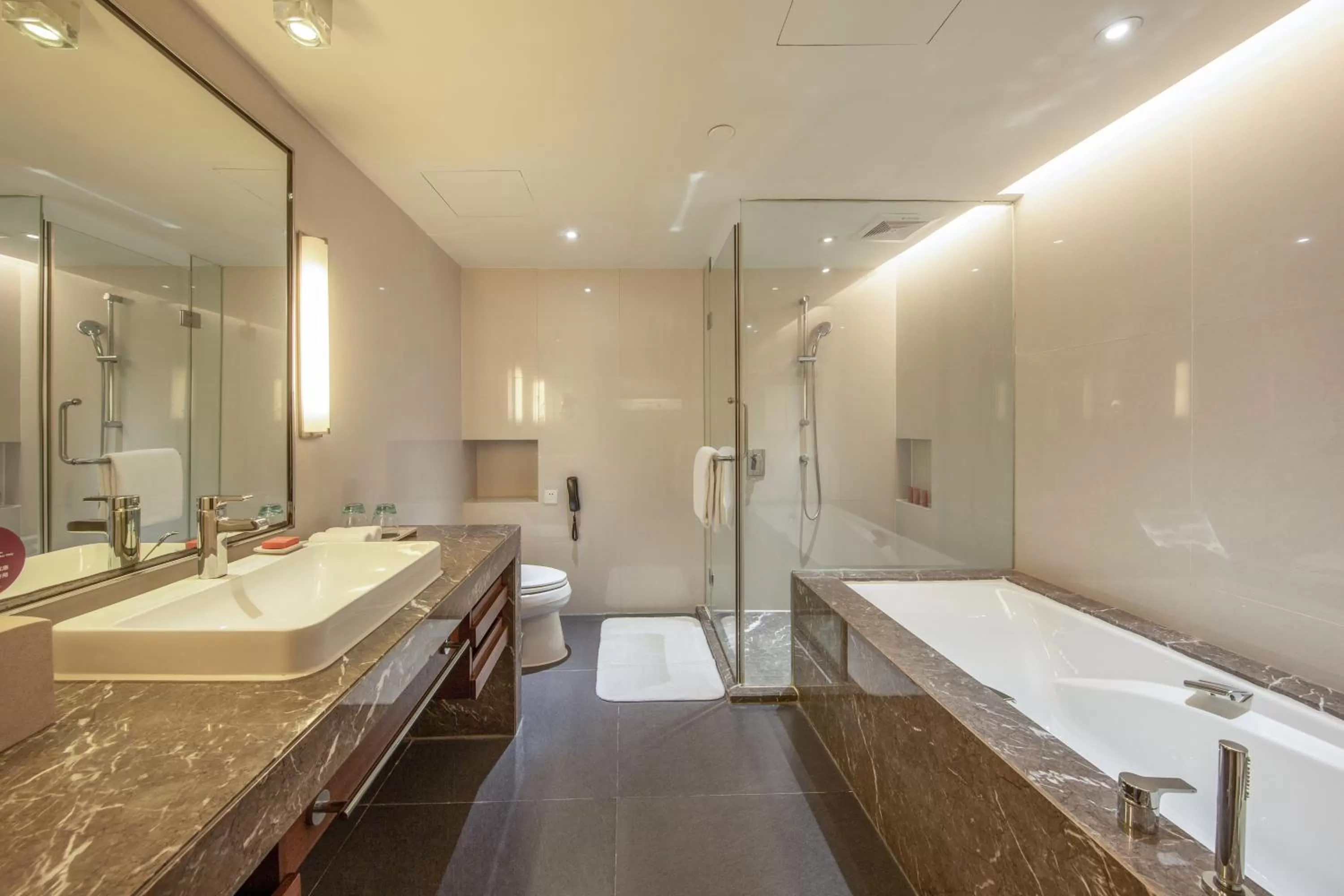 Bathroom in Crowne Plaza Guangzhou City Centre by IHG
