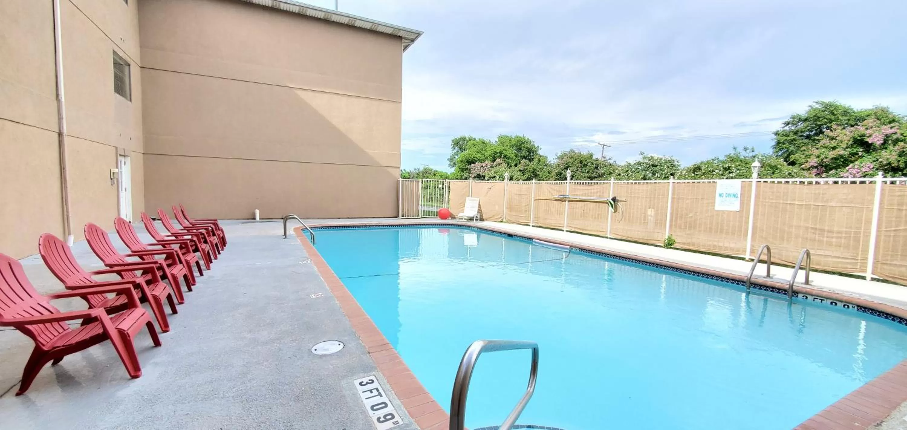 Pool view in Super 8 by Wyndham Temple I-35