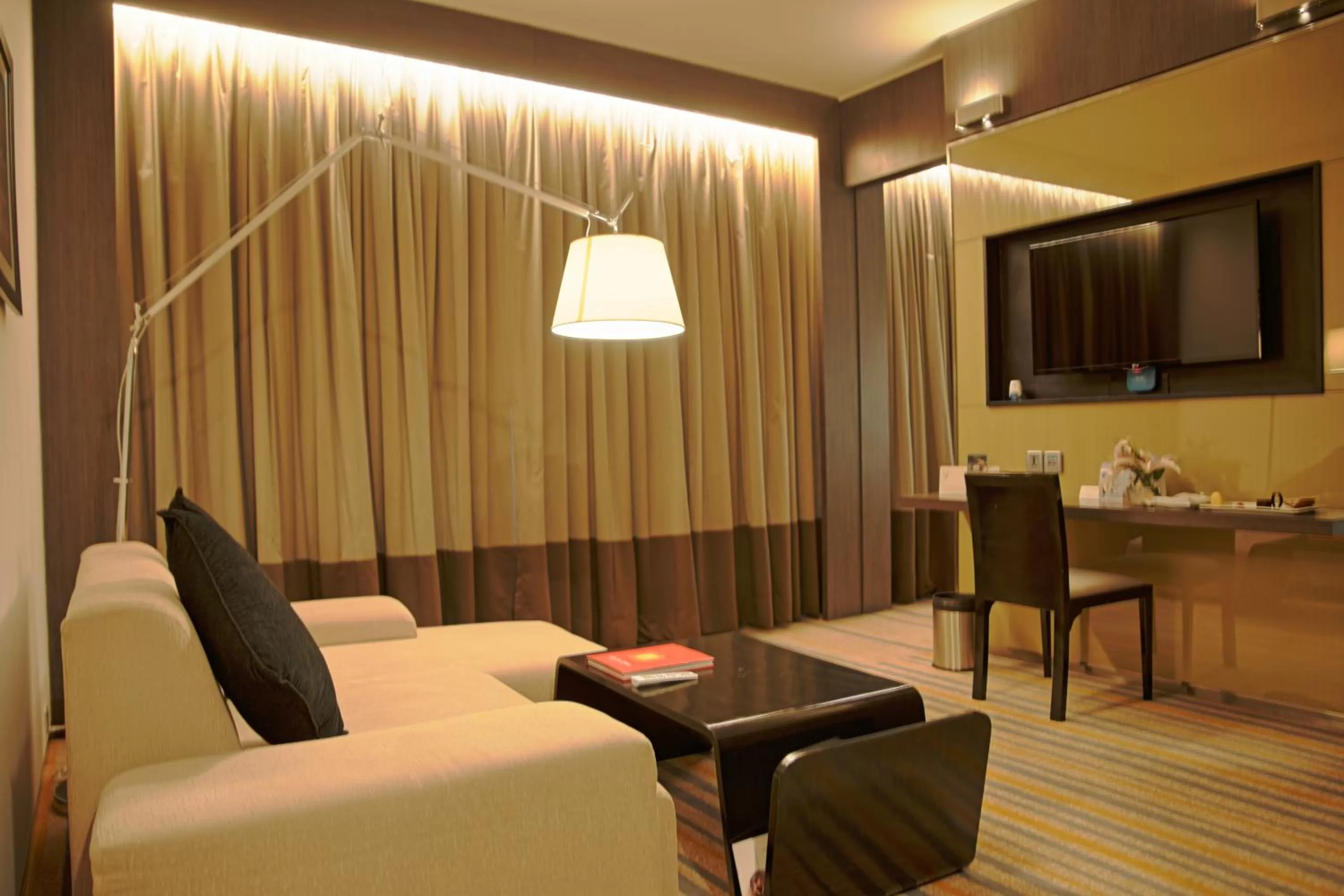 Communal lounge/ TV room in Novotel Kolkata Hotel and Residences