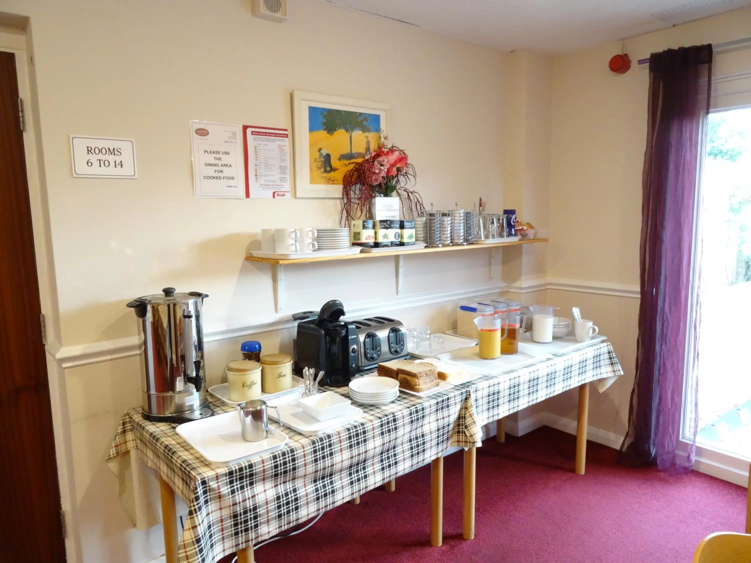 Dining area in AJ Lodge
