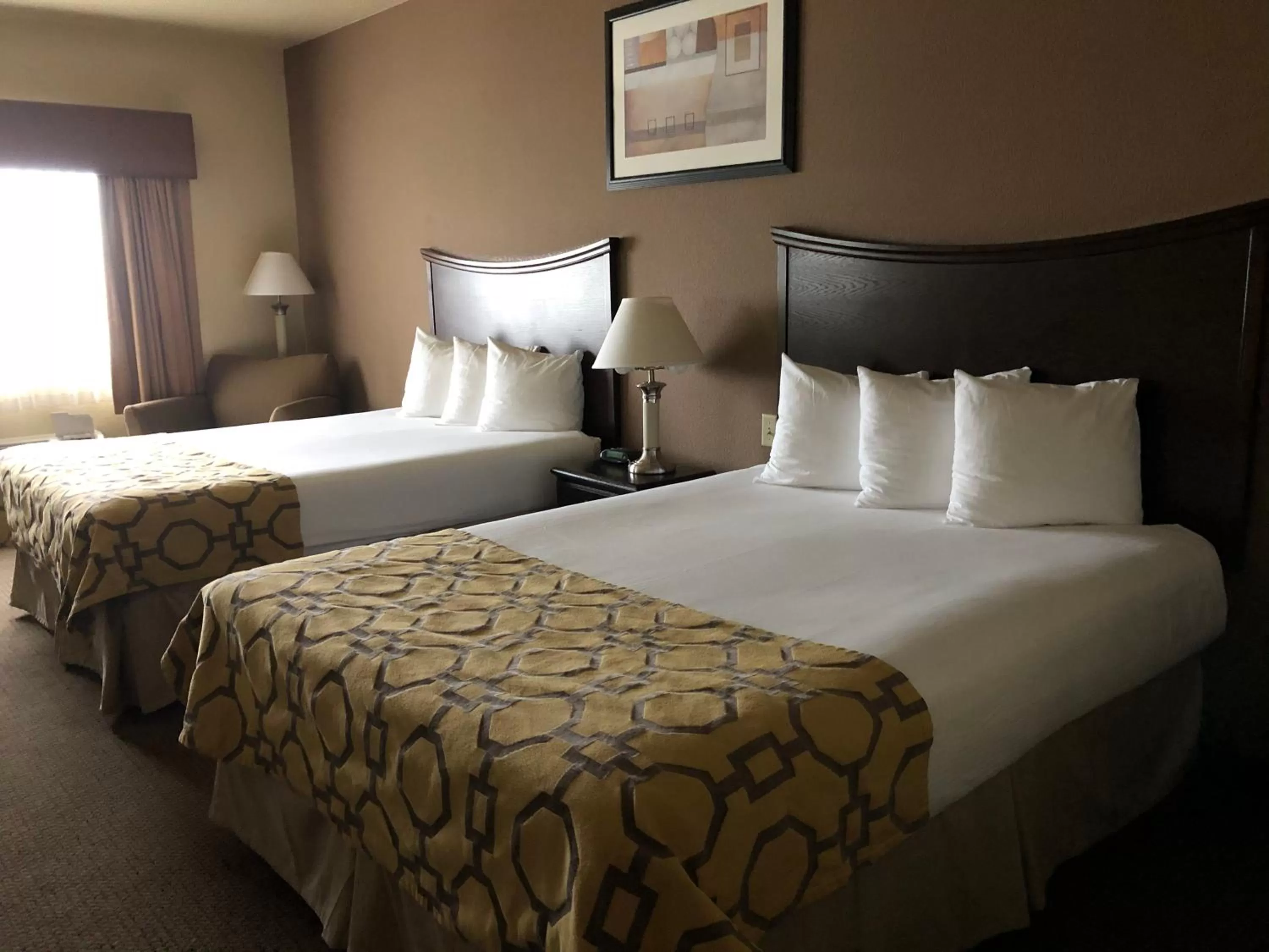 Bed in Baymont by Wyndham Decatur