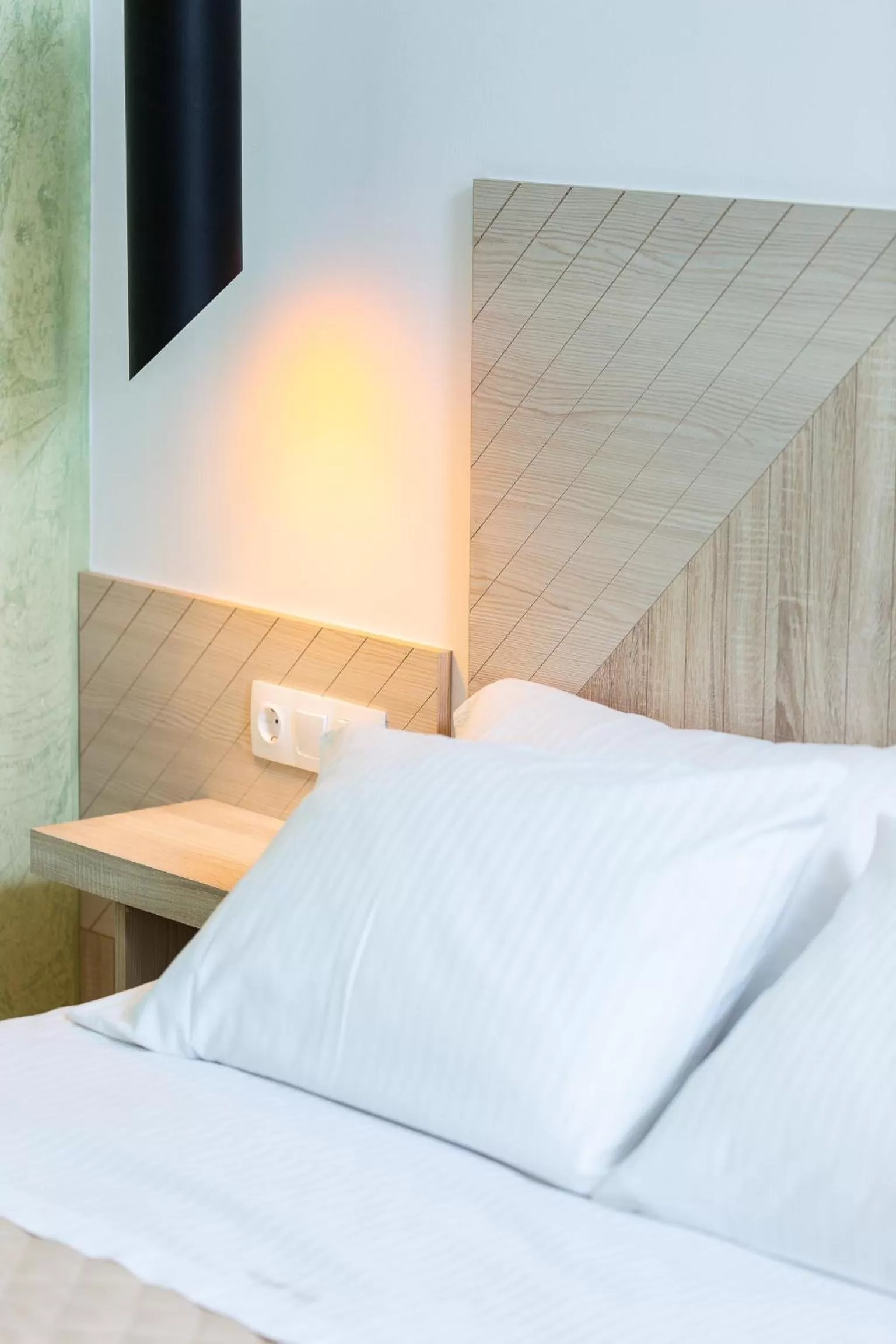 Bed in Ark 68 City Rooms