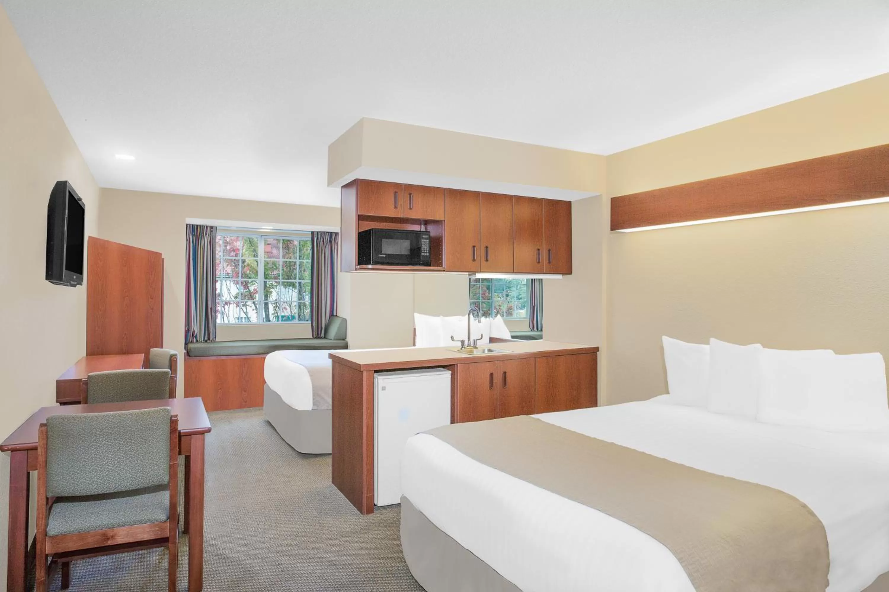 Bedroom in Microtel by Wyndham Bentonville