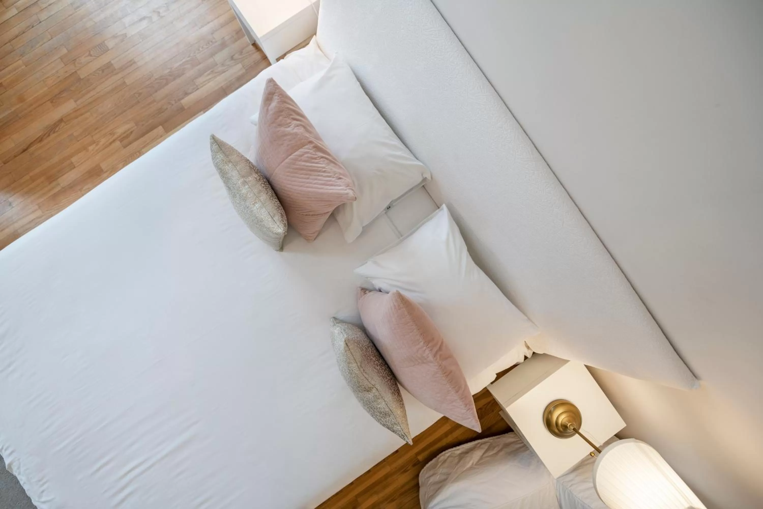 Bed in Vilnius Apartments