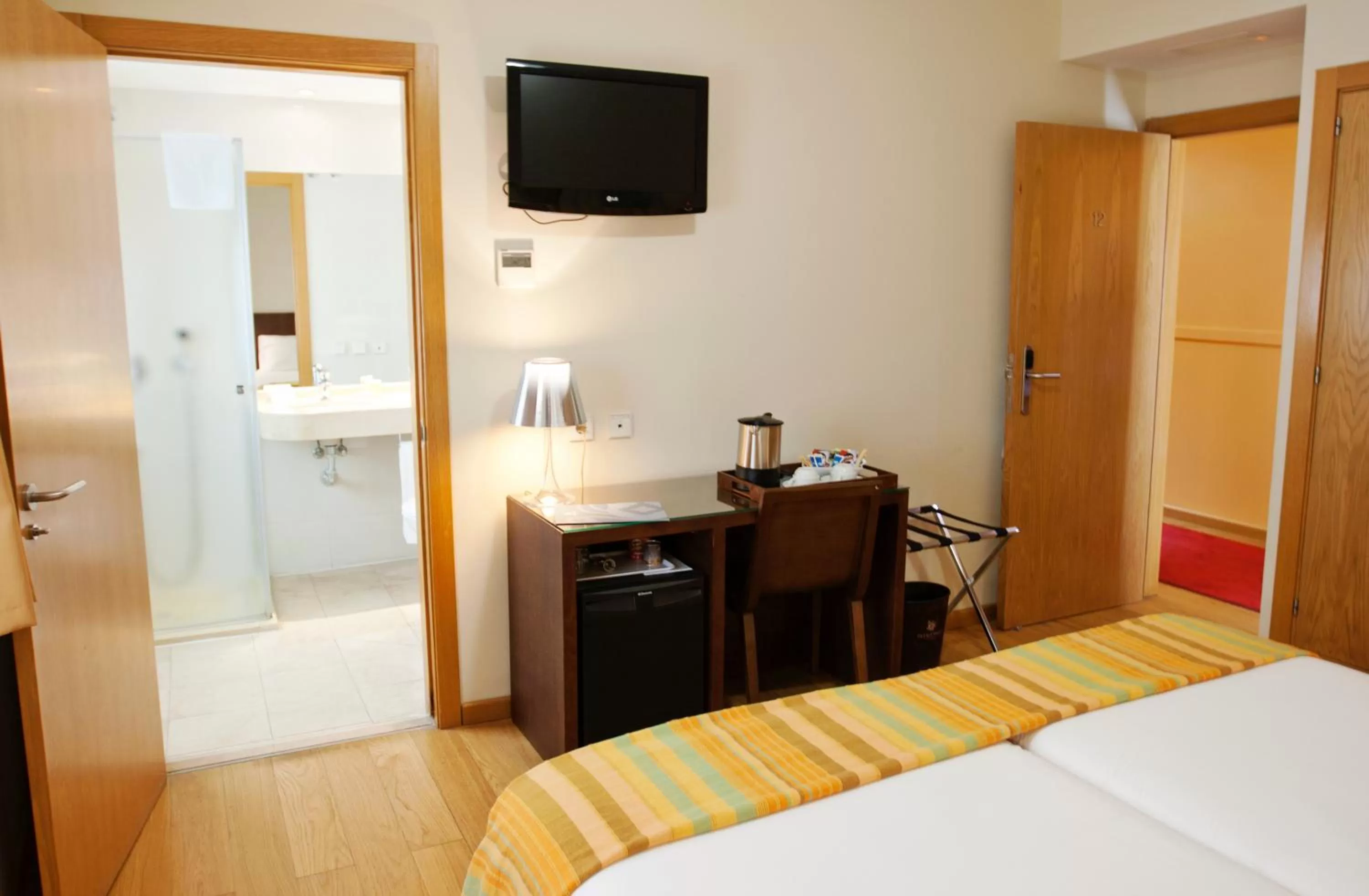 TV and multimedia, Bed in Hotel Apartamentos Patagonia Sur