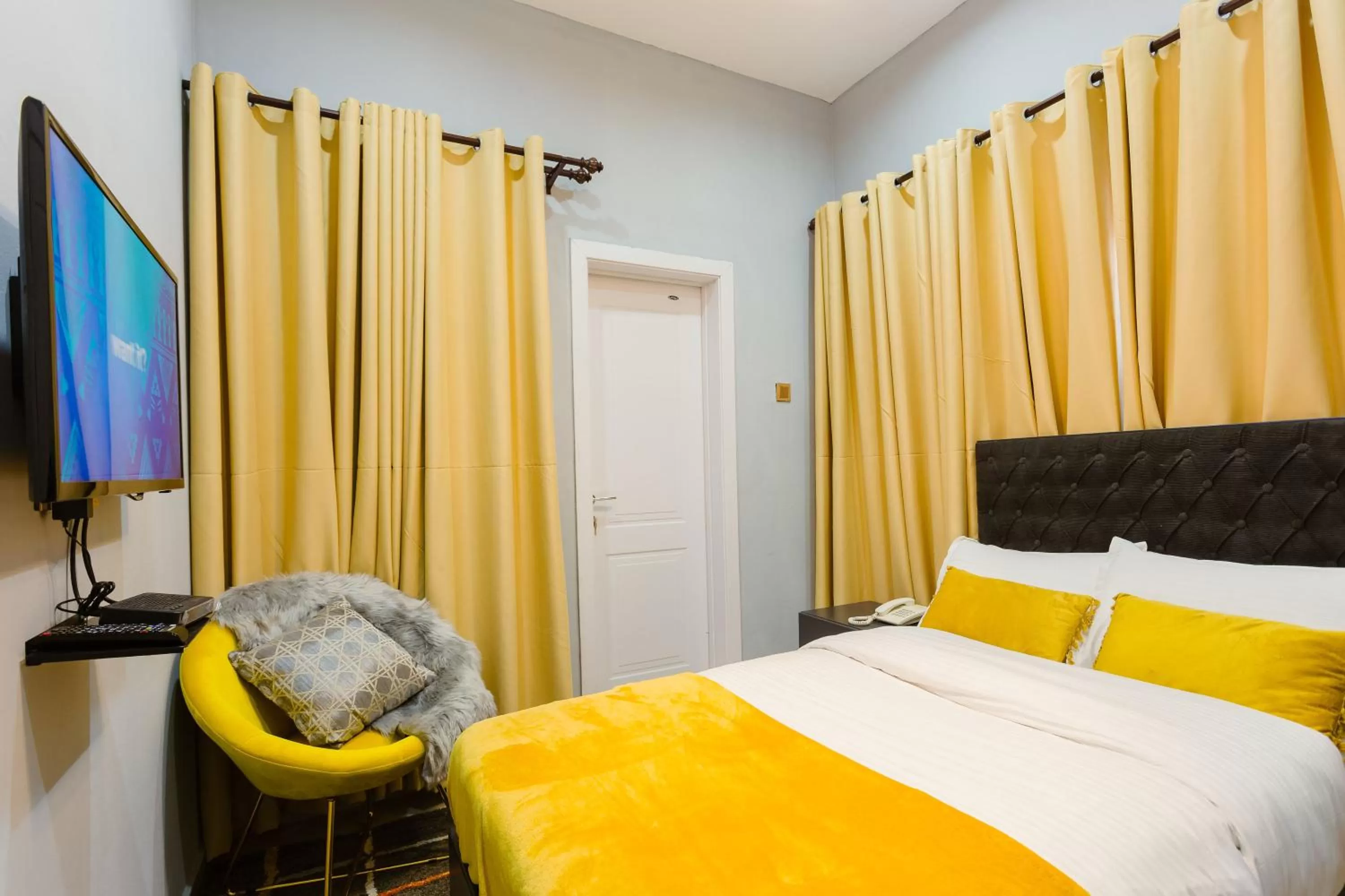 Bed in The Avery Suites, East Legon