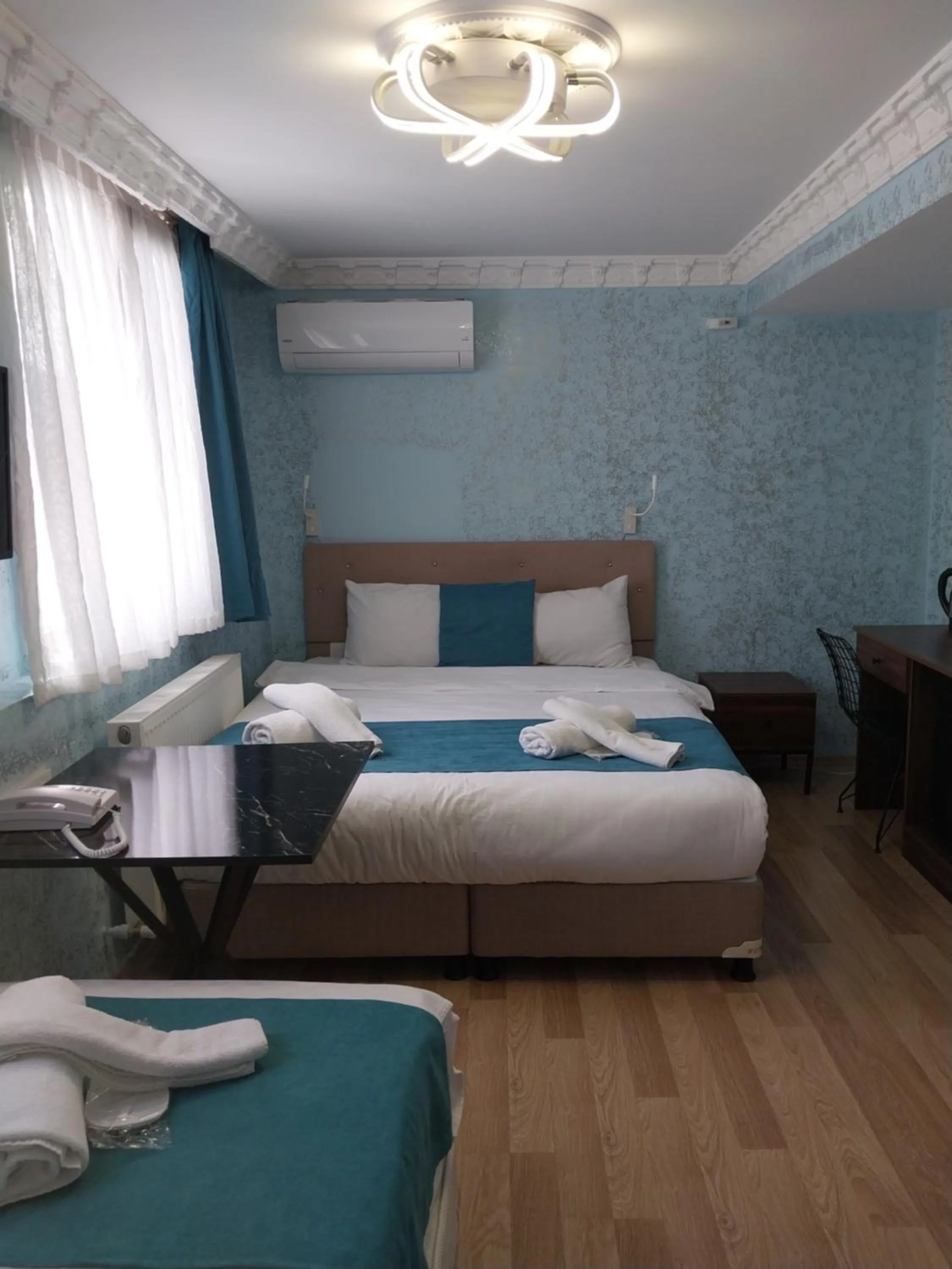 Bed in blue sail hotel