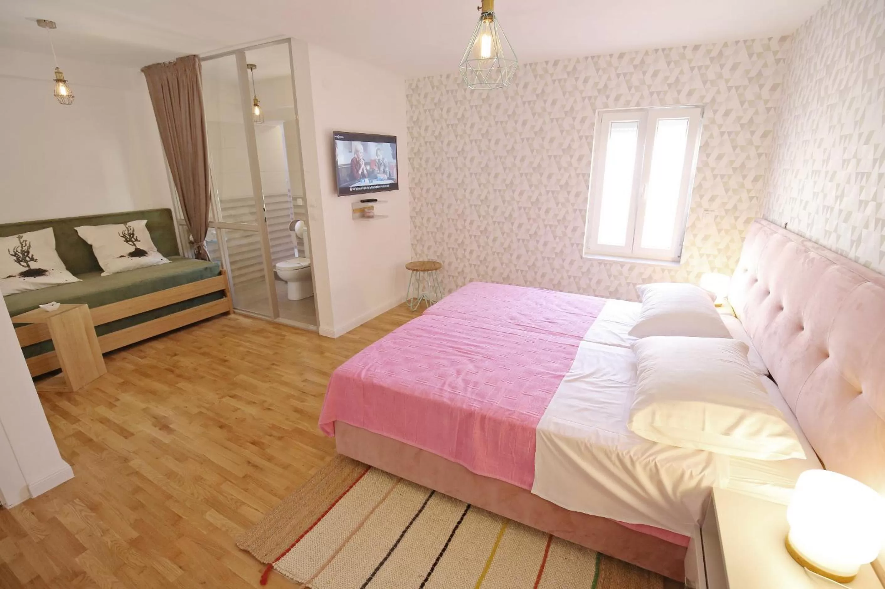 TV and multimedia, Bed in Central Apartments Integrated Hotel