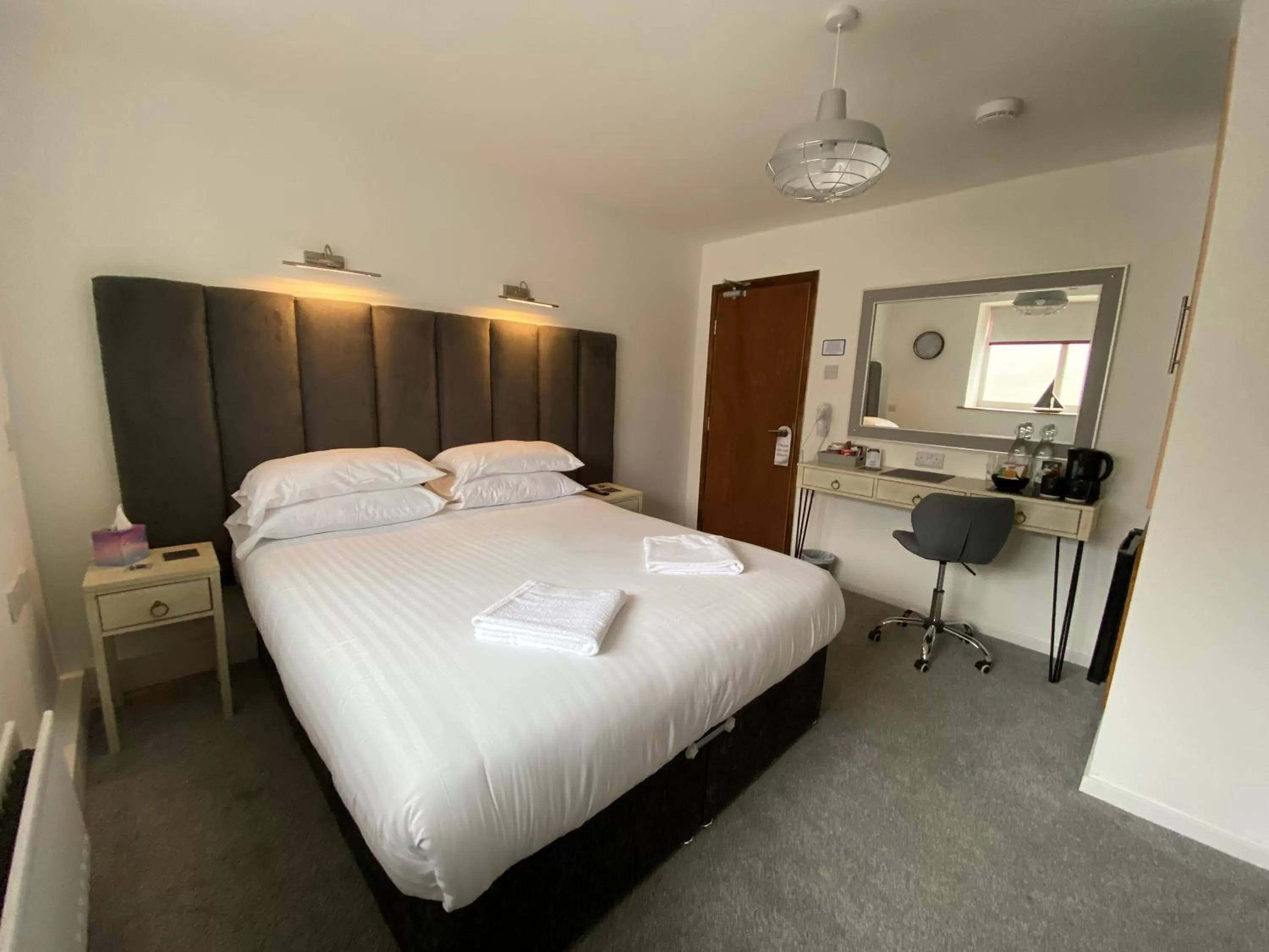 Bed in The Crossroads Inn