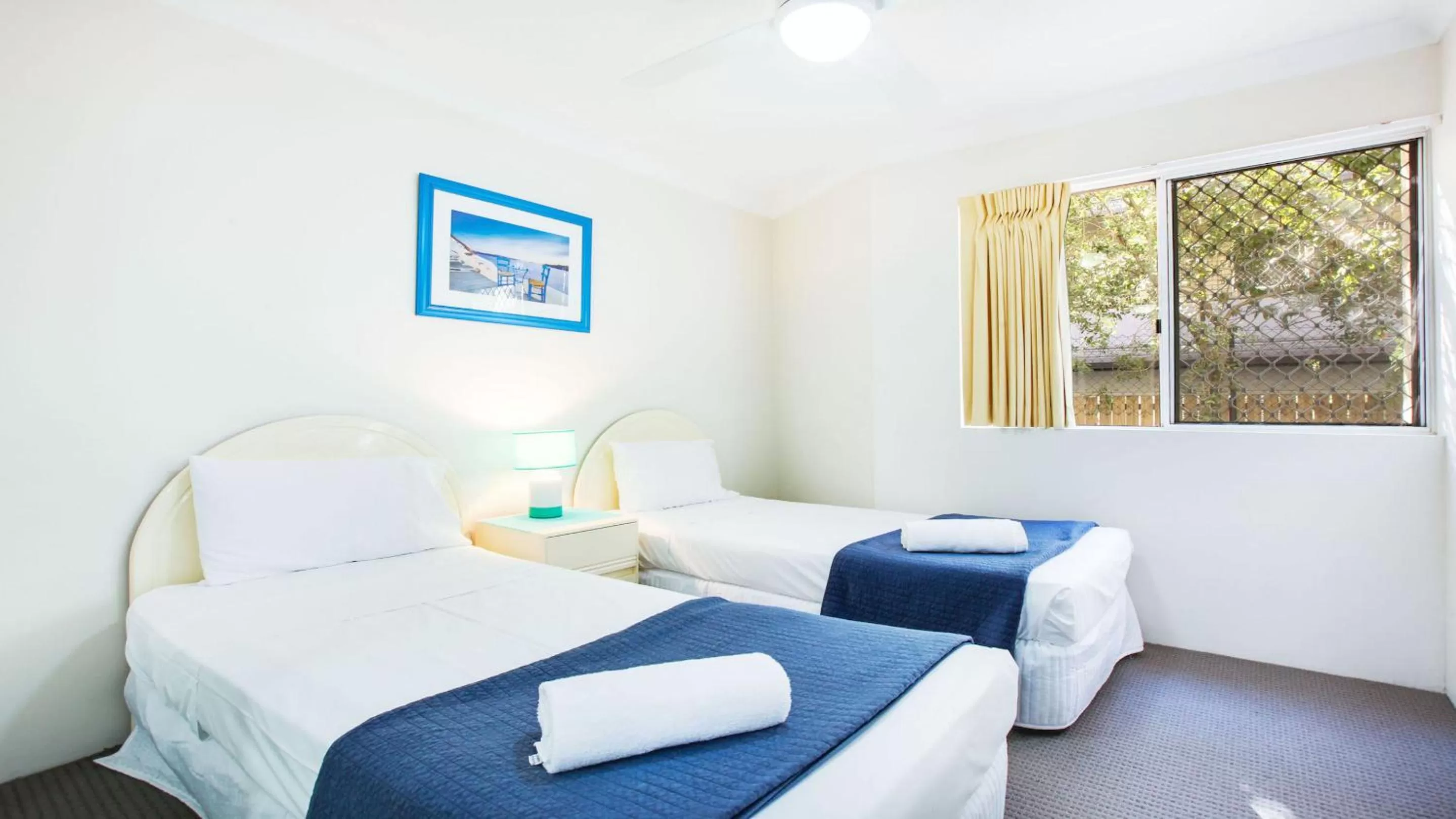 Bed in Mari Court Resort