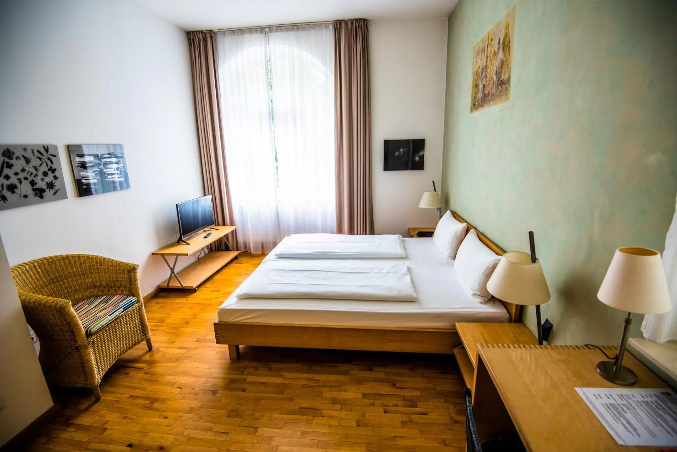 Bed in Art-Hotel Robert Mayer