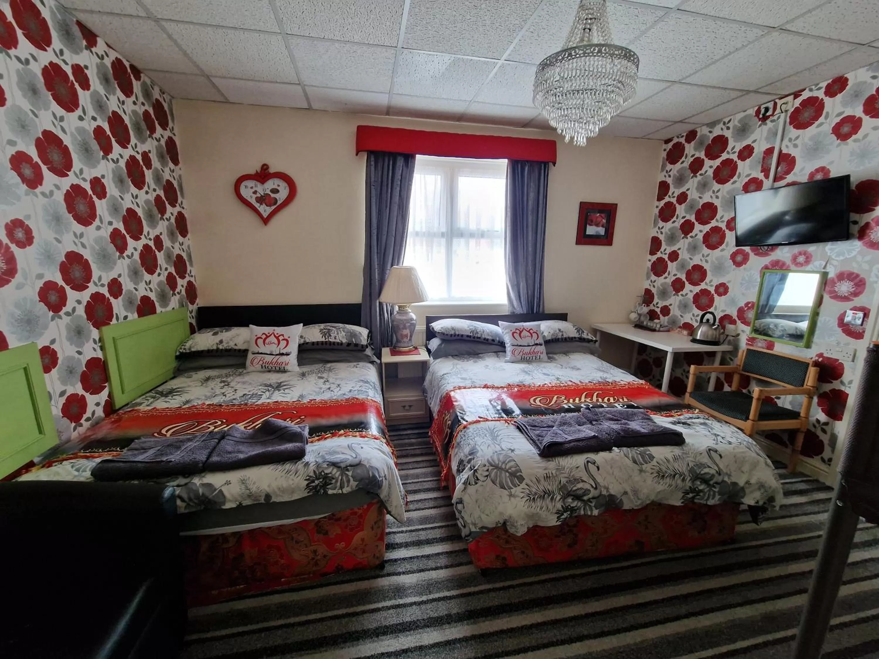 Bed in BUKHARI Hotel