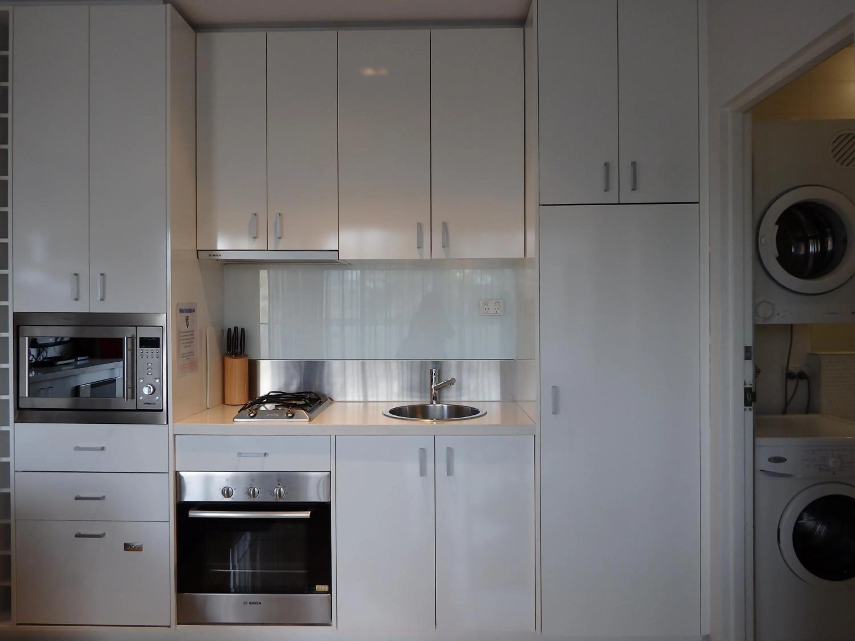 Kitchen or kitchenette in Hiigh Apartments