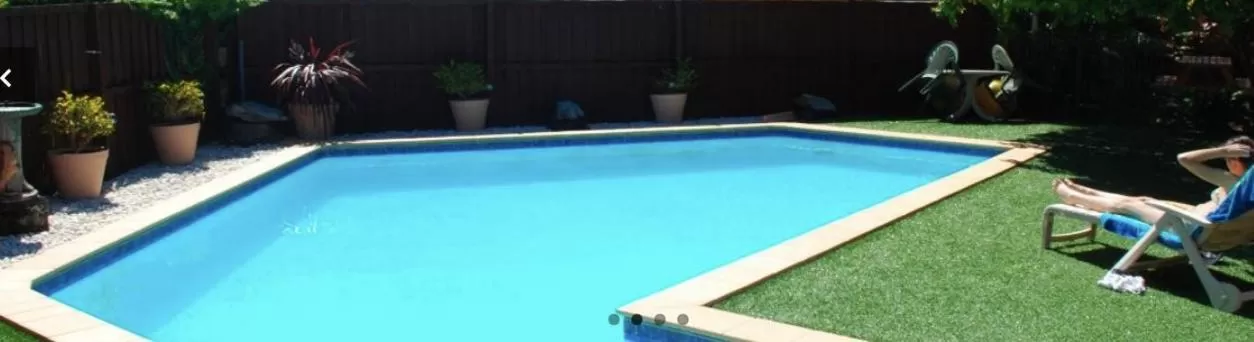 Swimming pool in Port O'Call Motel