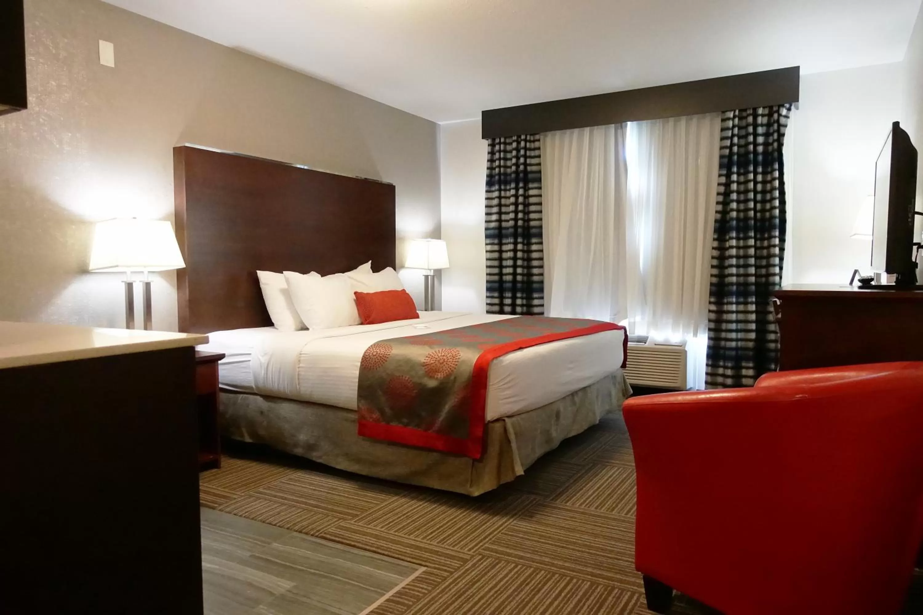 Photo of the whole room, Bed in Ramada by Wyndham Moose Jaw