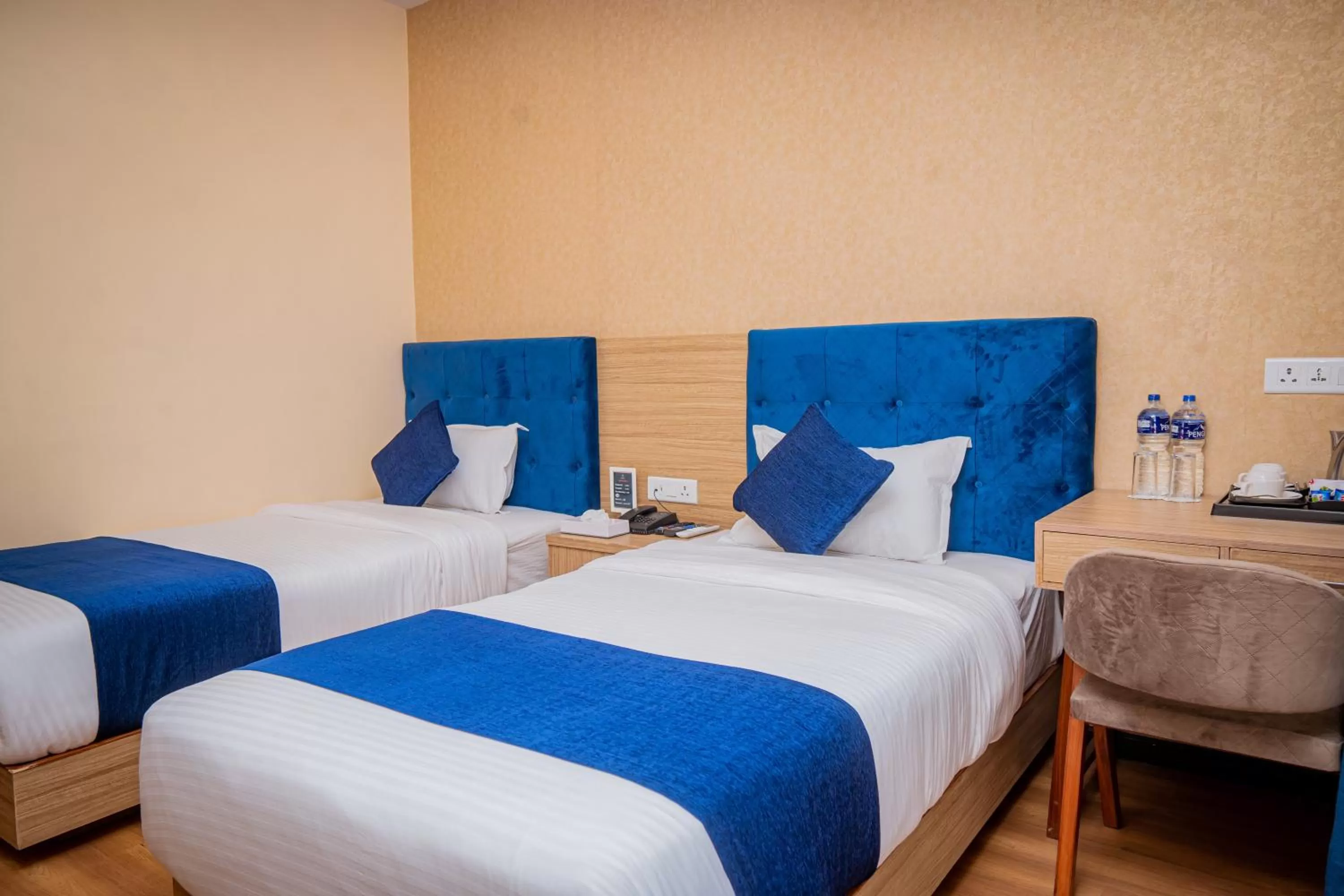 Bed in Majestic Lake Front Hotel & Suites