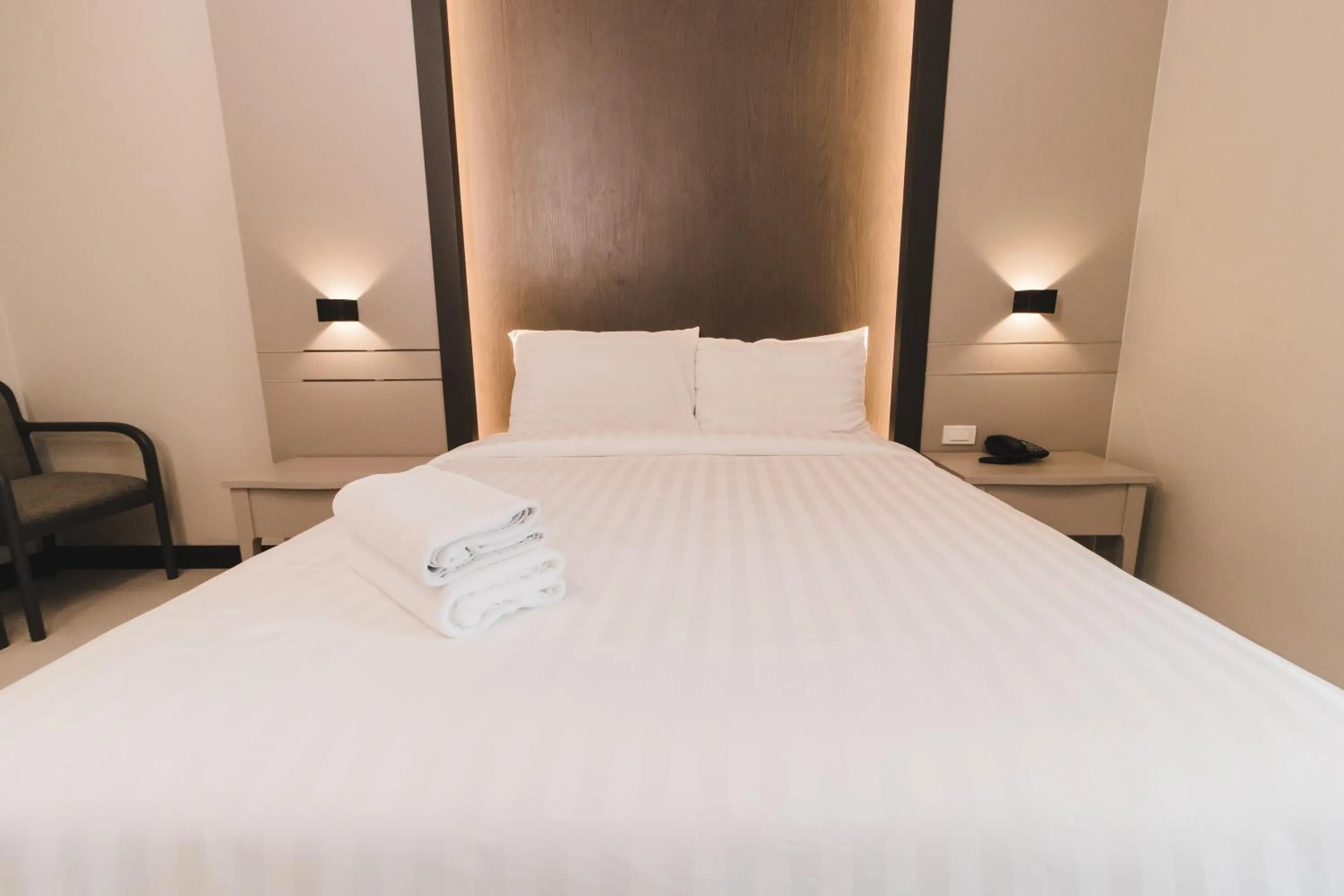 Bed in So good Hotel Bangkok