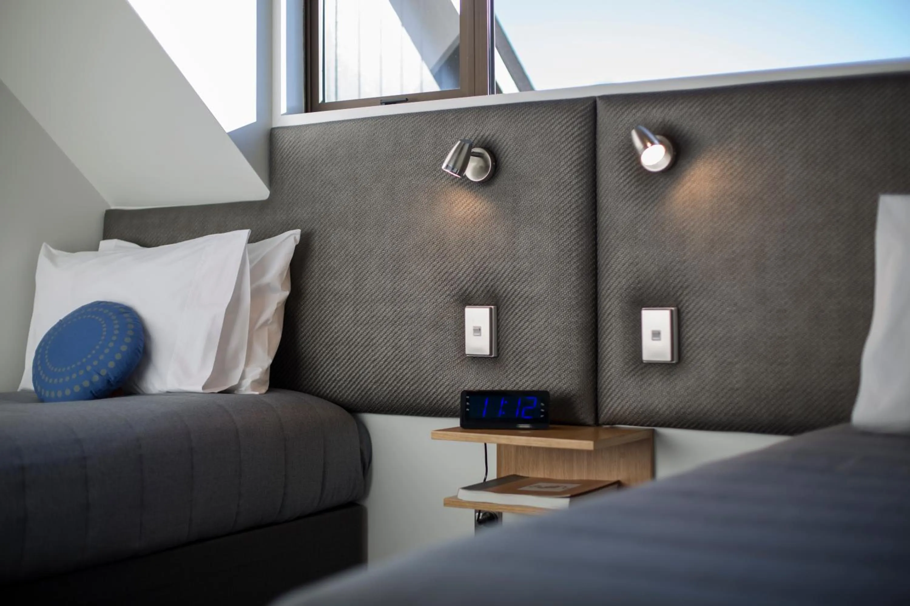 Bed in Dunedin Motel and Villas