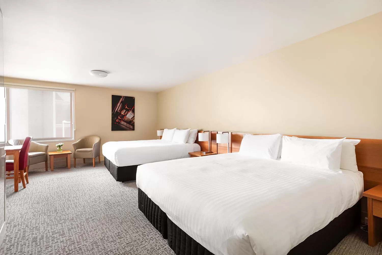 Seating area, Bed in The Old Woolstore Apartment Hotel