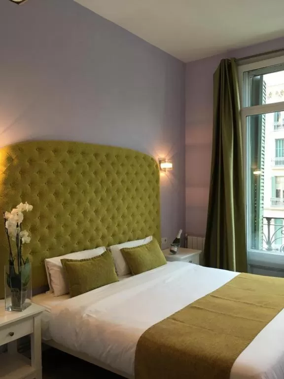 Bed in Hotel Ginebra