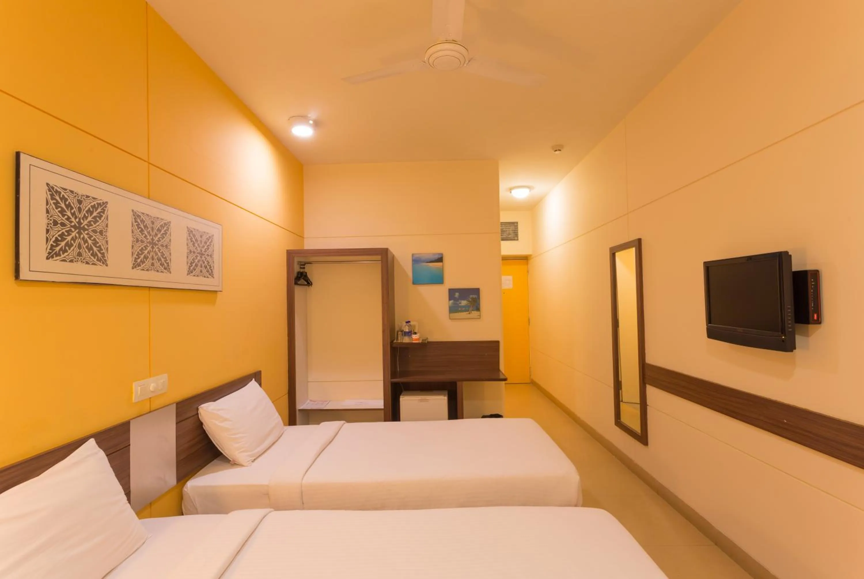 Photo of the whole room, Bed in Ginger Mangalore