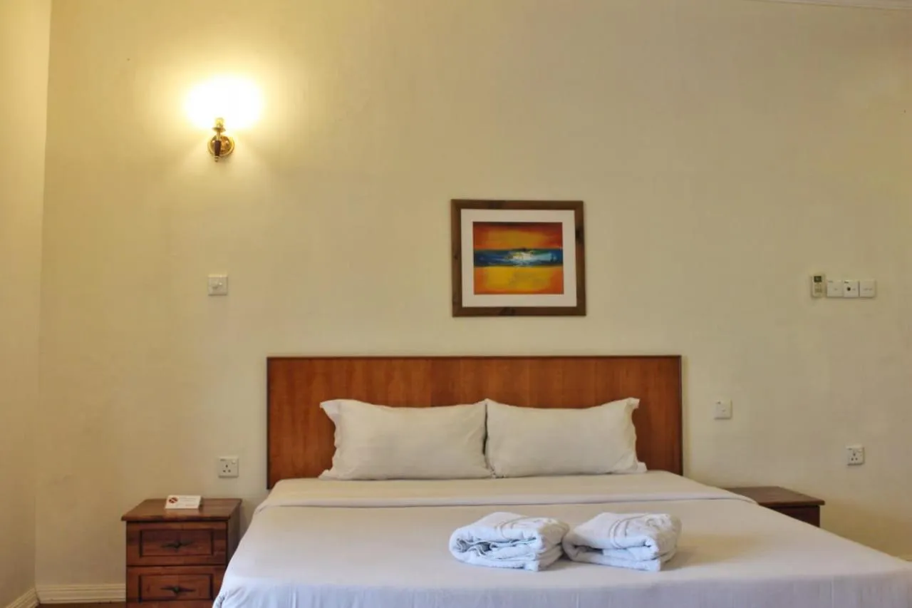 Bed in Tiara Labuan Hotel