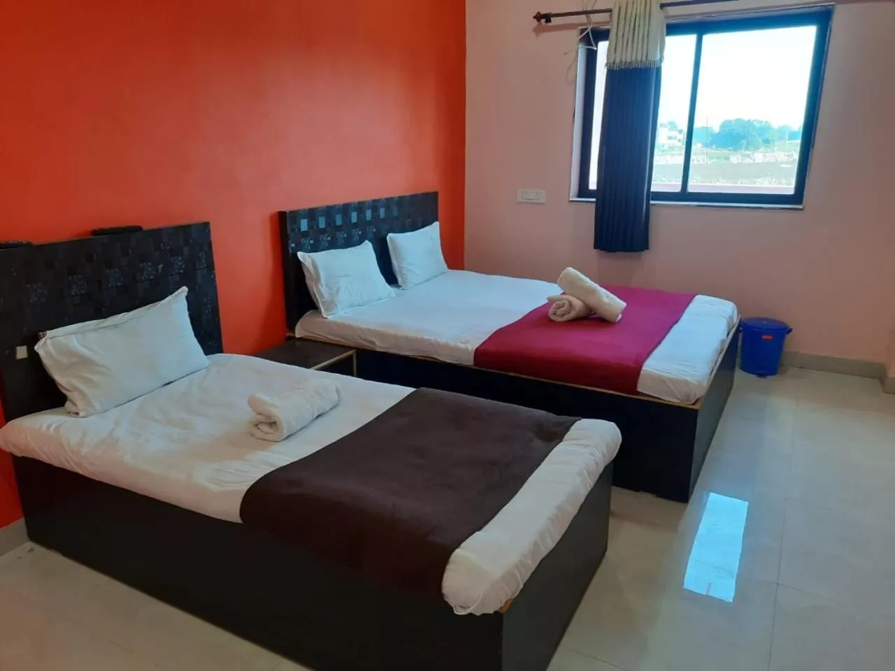 Bed in Hotel Nisarg Lodging And Restaurant