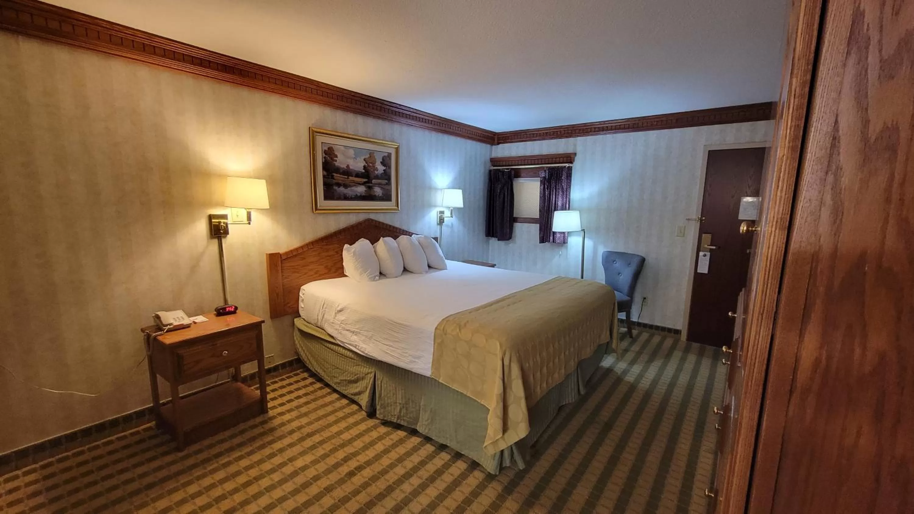 Photo of the whole room, Bed in Ramada by Wyndham Saginaw Hotel & Suites