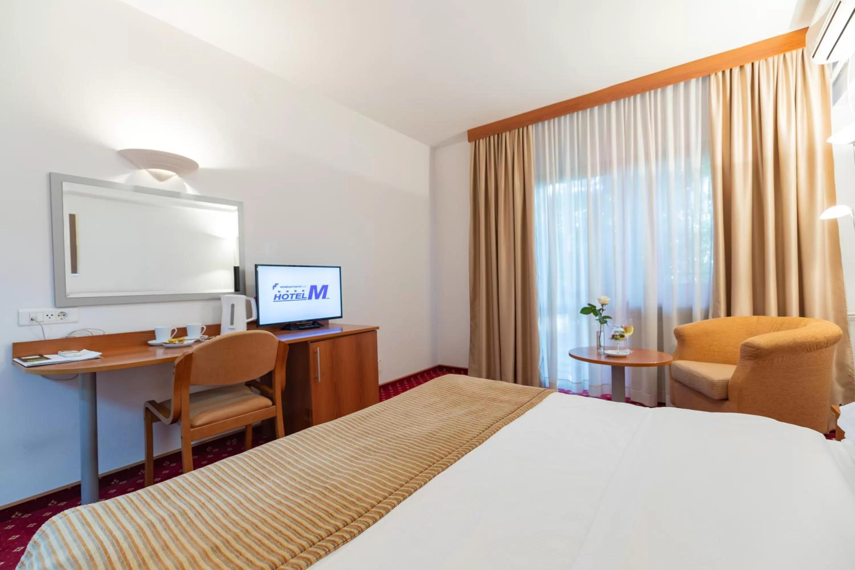 Photo of the whole room, Bed in Hotel M